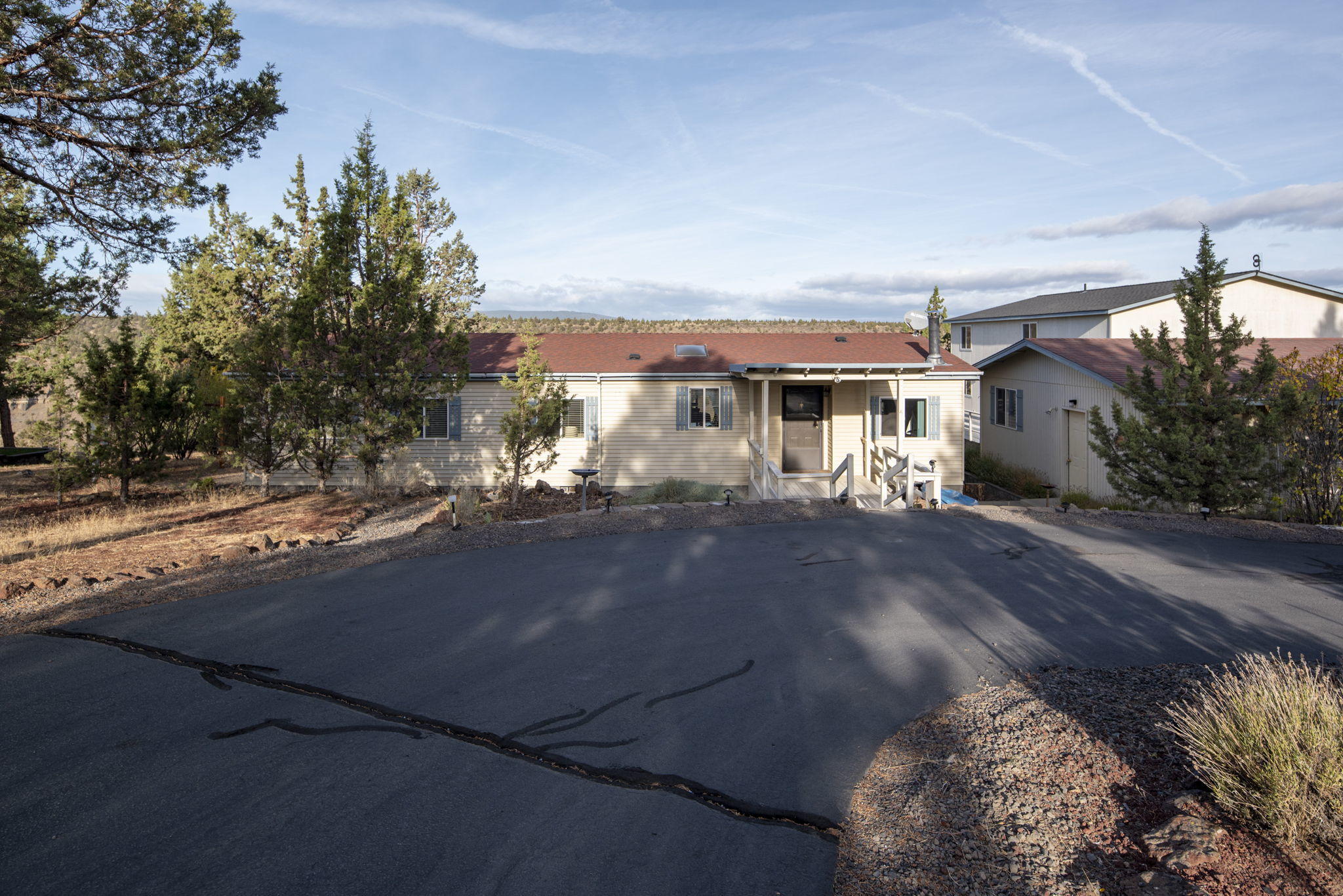 Fabulous Deschutes River Canyon Location for this unique duo:  Huge 3 story shop that includes a bath and two rooms for guests, hobby, office, etc and manufactured home in excellent condition on a paved road. 

If you love adding your own touches, you will love the opportunity to update to your hearts desire.  Must see this Canyon home to take in the beauty of the surrounding Basalt Canyon Walls and Deschutes River Below.  Views of the Cascades to the south.  Marvelous location on paved road.  

And all that Crooked River Ranch has to offer:  golf, swimming, fishing, tennis, pickle ball, hiking, parks, restaurants, clubs, abundant wildlife and rich community life.  Close to Central Oregon recreation, shopping, restaurants and the rich urban vibe of Bend.