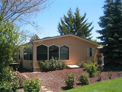 Nice MH in Tolman Creek Park #31! Newer model 1987 with great space indoor and out. Large home with lots of skylights, built-ins, 3 bedrooms all with walk-in closets. Vaulted ceilings, large picture windows looking out into a park like setting that somebody else maintains. This is a great spot, nice home and a quick sale.