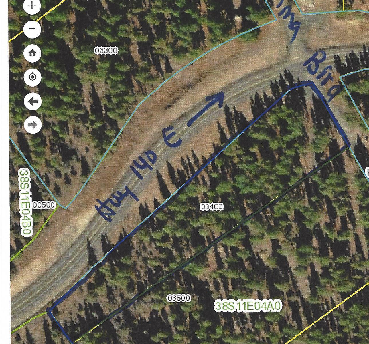 4.29 Acres -Great fairly level  with some variation  covered with lots of large nice trees.