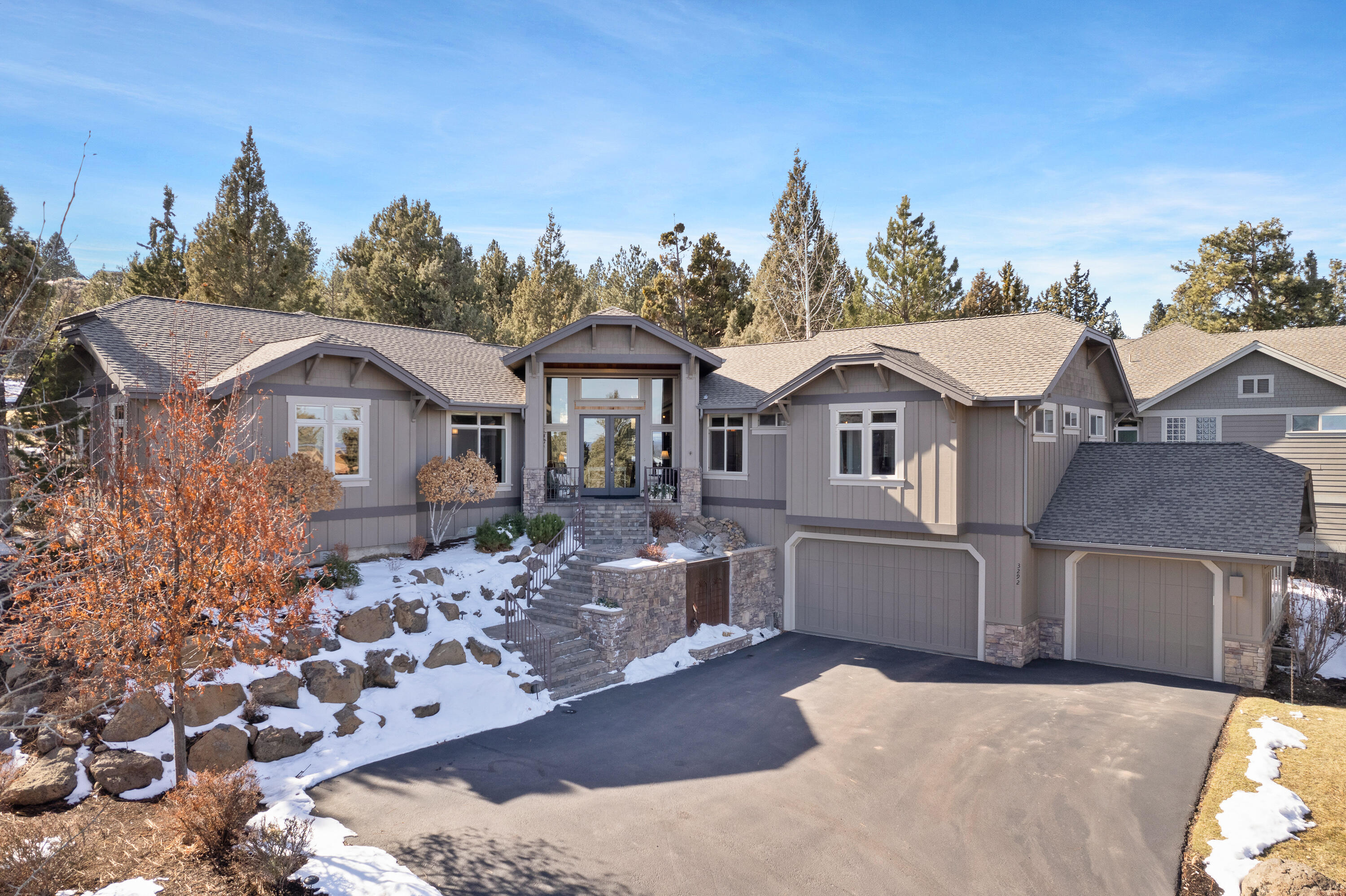 SINGLE LEVEL LIVING on the 8th FAIRWAY of River's Edge Golf Course. This custom home lives on one level w/views of the golf course in the rear and City and Easterly mountain views from the front. Entry/living room include hardwood floors, floor to ceiling stone gas FP, built-in entertainment center, vaulted ceiling, formal dining room and eating area. Kitchen with granite counters, Jenn Air 6 burner gas range, hood, double oven, dishwasher, microwave & slate floor w/radiant heat. Primary bedroom w/views & door to patio, bathroom to include jetted tub, tiled shower, travertine counters/floors, double sinks, radiant floors and a huge closet.  Two guest suites with private baths.  Den/office with French doors could also be a 4th bedroom. Enjoy the paver back patio as the golfers play through & front porch has a water feature.  50 year roof, 3-car garage, AC, humidifier & surround sound.  Just blocks to Upper Sawyer Park and the Deschutes River Trail.  Close to restaurants & shopping.
