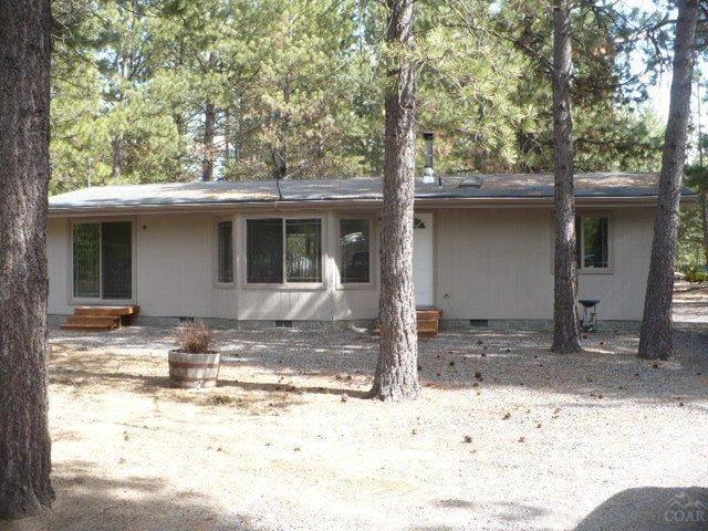 Great home in desirable Ponderosa Pines. Open spacious floor plan with master separation. Two large sheds. Newer concrete septic.