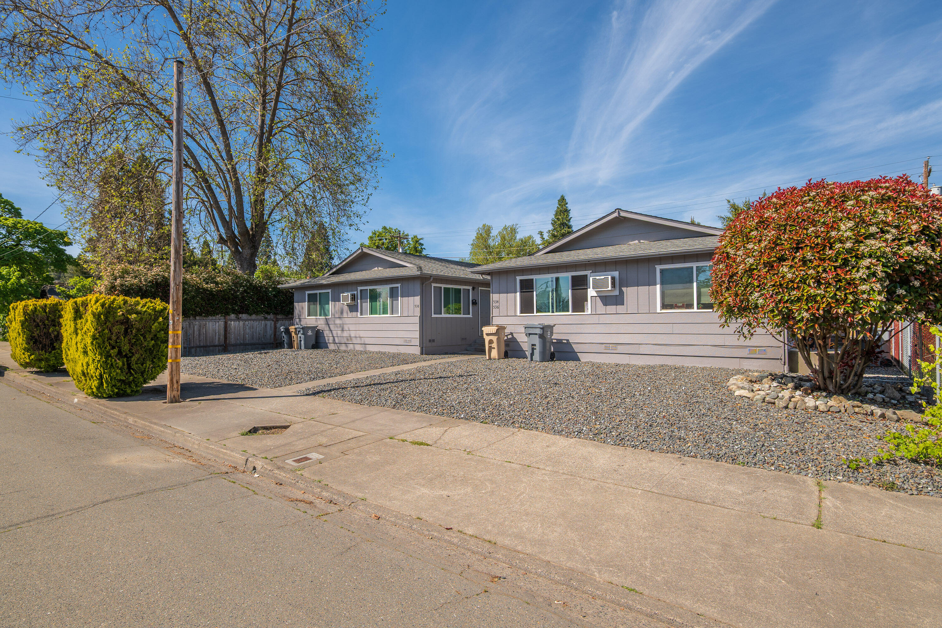 Investment opportunity!!!.  Here is your chance to own a turn-key triplex near the heart of downtown Grants Pass!   Each unit is currently leased on a month to month basis by 5+ year tenants.  Each unit is roughly 800 sqft and are identical in layout/floor plan.  Two units have been upgraded with new kitchen cabinets, new appliances, and new vinyl windows. The property is Zoned R-3 and was recently assessed by a land use consultant who determined lot space can accommodate 1 additional unit if desired. units are complete with off street parking, exterior storage sheds and 1 single laundry room (unit 538).  Schedule an appointment today and make this investment your own! Seller is requesting all offers be submitted using OR forms or OREF forms.