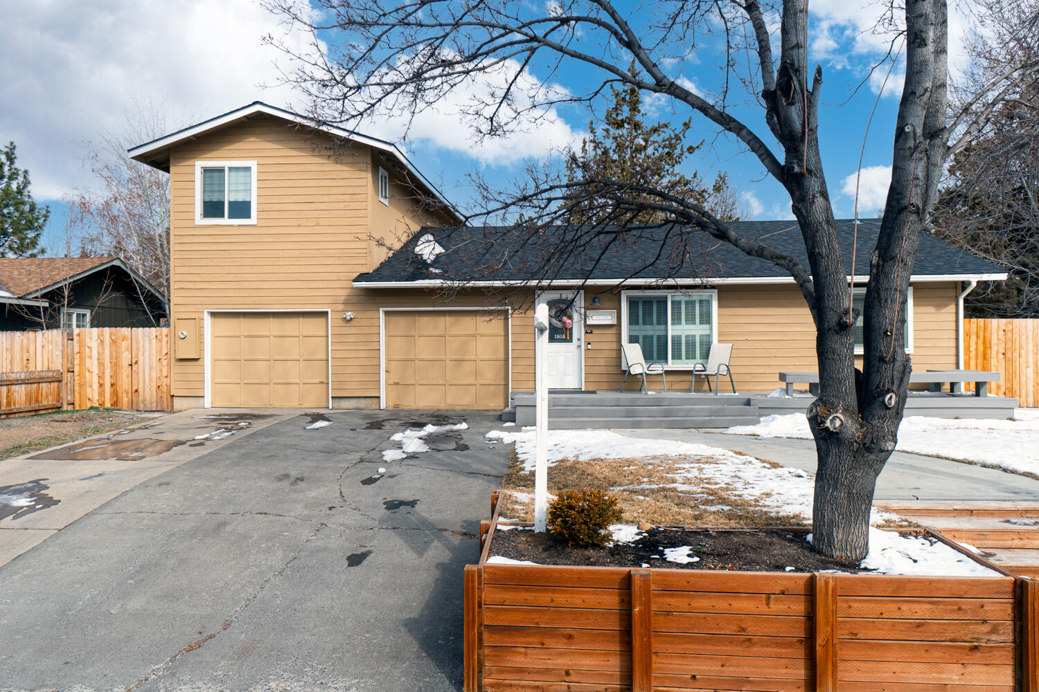 Don't miss this charming home in Tamarack Park of NE Bend, minutes to Pine Nursery Park, Costco, & all that Bend has to offer! Thoughtful design throughout this entire home! Main living area ftrs warm hardwood flooring, wainscoting & shiplap accents throughout, a decorative fireplace in the bright naturally lit living room. Amazing farmhouse style kitchen ftrs buffet or coffee bar, free standing island, double oven, authentic brick backsplash, natural butcher block countertops, farmhouse sink, floating shelves, large walk-in panty w/ built in shelving, eating area plus a spacious formal dining room. 5 bedrooms featuring a double master, baths ftr custom tile floors & tile surrounds, quartz counters, most w/ built-ins, new vanities & more. Back deck w/pergola & plenty of space for entertaining. Landscaped, fully fenced, storage sheds, plus gate for RV/toy parking! Don't miss this one!