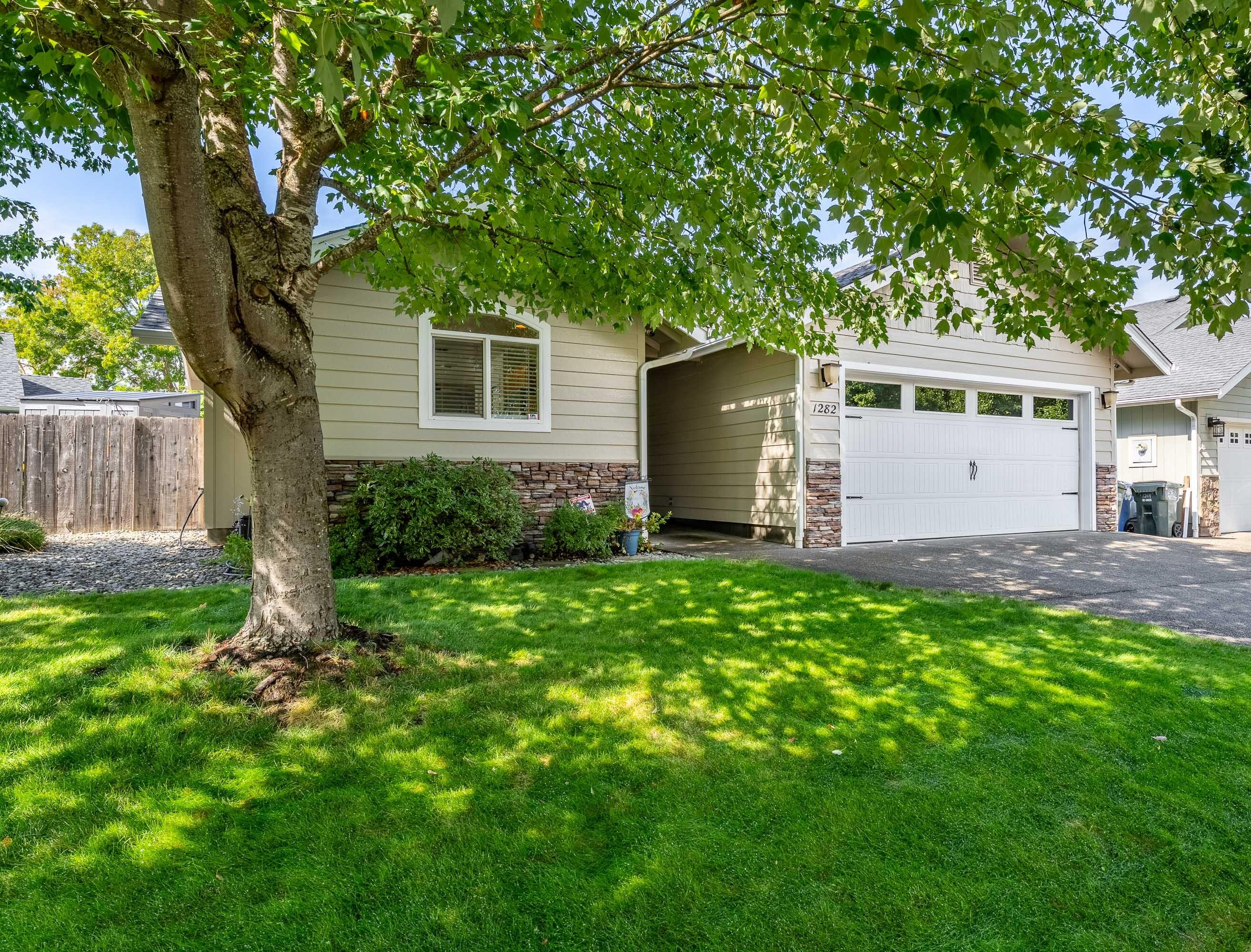 Set along a tree-lined street, this welcoming 3 bed, 2 bath, 1,342 sq ft home combines comfort with thoughtful updates. Vaulted ceilings enhance the open living space, while the primary suite offers a walk-in closet, dual vanity, and step-in shower. Recent improvements include a brand-new 50-gal water heater (2025), newer kitchen appliances, washer/dryer, exterior paint, and HVAC. The fully fenced and beautifully landscaped backyard features a covered patio, newer storage shed, and room for RV parking. A well-cared-for home with lovely curb appeal, that's move-in ready and waiting for your personal touch. Please ask for Feature & Good To Know List! Additional info on file and available, too!