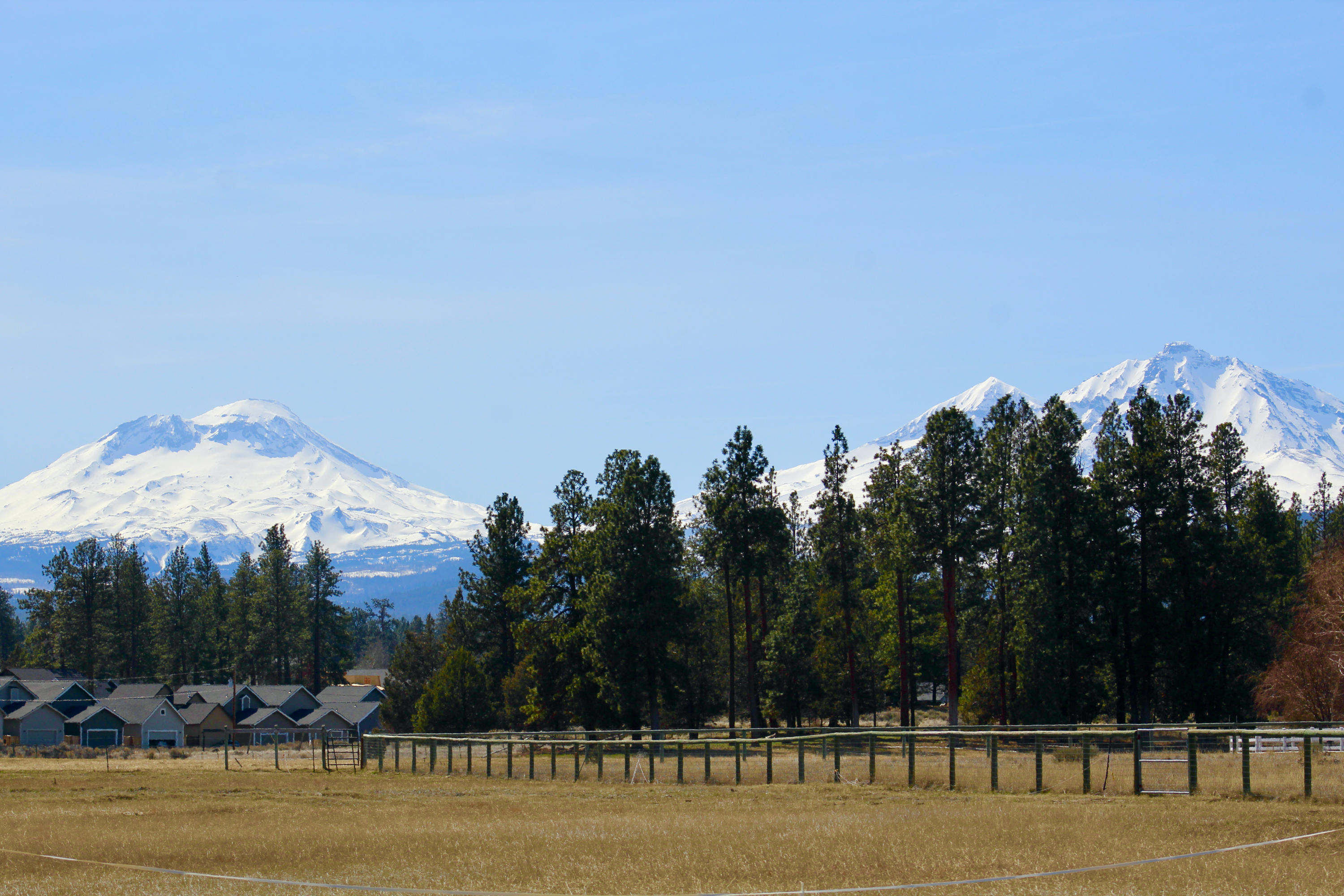 RARE find in Sisters! 15+ stunning meadow acres with majestic MOUNTAIN views of Broken Top & the Three Sisters from the house, and incredible unobstructed 7 mountain views along Indian Ford Creek at the back of the property. On a private cul-de-sac, this property has the benefits of low taxes while only 1 mile from downtown Sisters.  Bring your cattle/horses, practice on your personal driving range, or just relax near your built-in fire pit and enjoy stargazing and the serenity of your own slice of Heaven. If your busy lifestyle calls for calm, this is your home. Amenities include: Granite counters, custom white oak cabinetry, 9-foot pantry, upscale laminate and tile flooring, built-ins, tiled showers, master steam shower,15'x30' Trex deck, 20'x20' paver patio, 6,500 sq ft of driveway and parking pavement. Shop and shed.