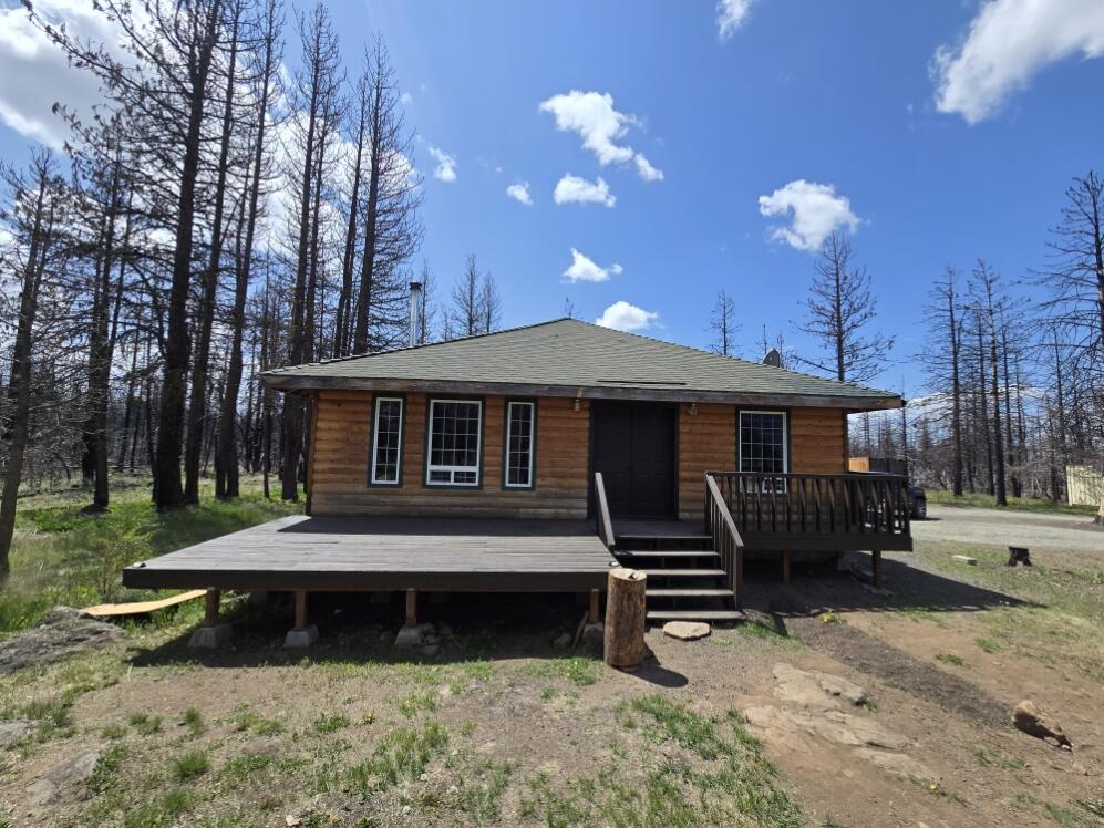 Escape the hustle and bustle of city life with this stunning off-grid log cabin, perfect for those seeking tranquility and independence. This charming 1-bedroom, 1-bathroom cabin offers 1,024 square feet of cozy living space featuring beautiful vaulted ceilings that enhance the open, airy feel.  Recently updated with new plumbing and a high-efficiency water heater.
Eco-Friendly Living: Equipped with a brand-new solar setup, allowing you to enjoy sustainable living without sacrificing modern comforts.
