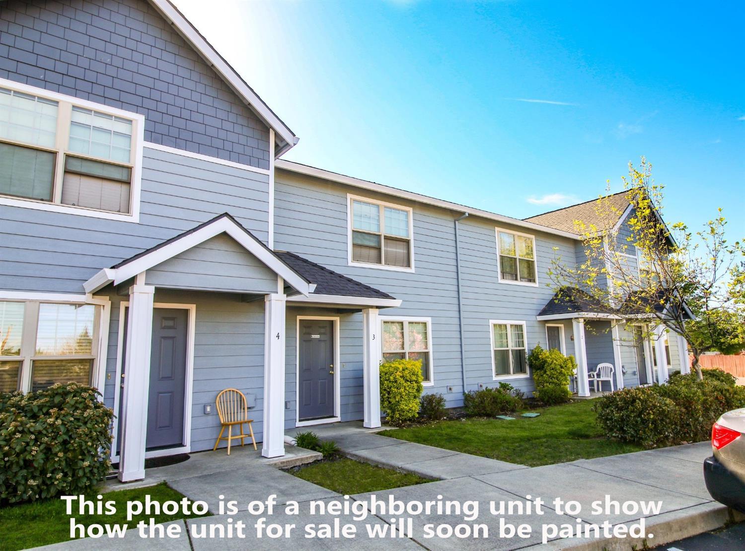 Attention buyers! Fantastic price on this clean condo in a great location! This 2 bedroom 1.5 bathroom townhome style condo is the perfect investment for someone wanting to get into real estate affordably! Clean kitchen with granite counters, large bedrooms, and over 1000 square feet. These units are currently undergoing excellent exterior upgrades that will include new paint very soon (some units are already completed). Comes with a numbered parking spot, covered back patio, and all appliances included! HOA covers water, sewer, garbage, exterior maintenance, insurance, and landscaping! Owner occupied only with the exception of the ability to rent to verified family members. Located within proximity to Costco, the Rogue Valley Mall, Trader Joes and more!
