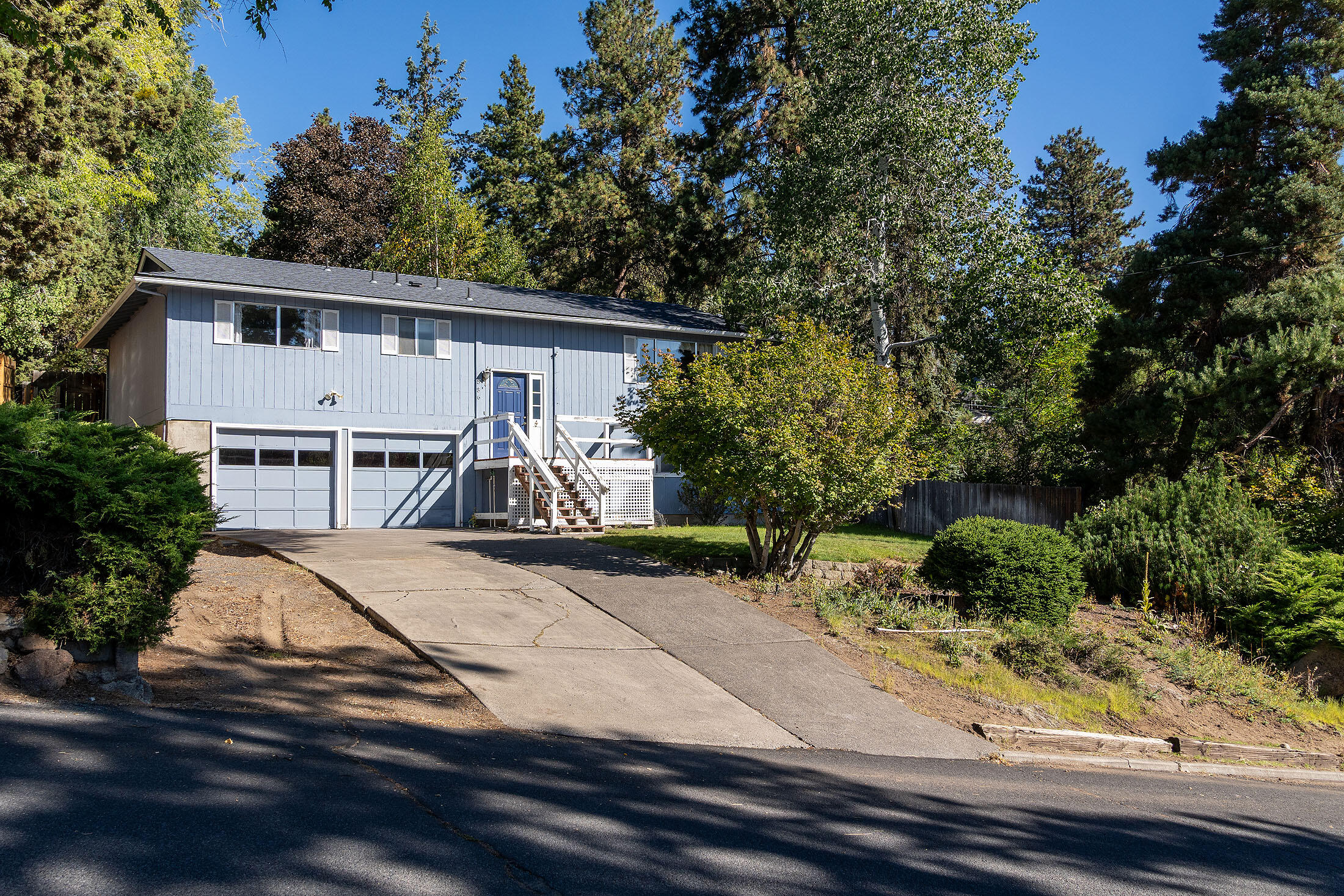 Nestled within the picturesque west hills of Bend, this exceptional mountain-view property offers a generously sized, fully fenced yard alongside a spacious back deck that is ideal for both entertaining guests and enjoying moments of relaxation. The oversized garage features a workbench and ample storage space, making it perfect for a variety of projects. A cozy pellet stove enhances the inviting atmosphere of the living area, contributing to the overall comfort of the home. This property beautifully combines practicality with natural beauty, making it an exceptional place to reside. Its advantageous location is just minutes from Pioneer Park and the river, downtown Bend, and only a 30-minute drive to Mt. Bachelor, providing easy access to outdoor adventures and urban amenities alike, thus making it a perfect retreat for both nature enthusiasts and city dwellers.
