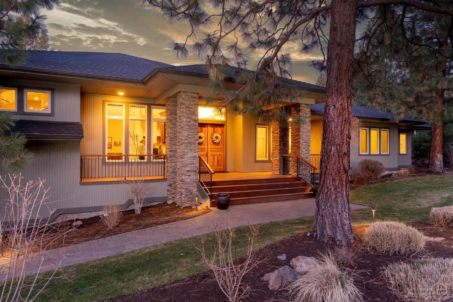 Welcome to Awbrey Glen, Bend's Premier Gated Golf Community. This Stunning Hm lives very much like a Single Story although you have a Spacious Bonus Rm Upstairs. Pavered Walkway leads to Inviting Mahogany Porch Entry. Great Rm has Raised Heath Fireplace on Thermostat, Built-in Entertainment Center & Walls of Glass w/ Remote Controlled Automatic Hunter Douglas Blinds Throughout. Gourmet Kitchen is an Understatement w/ Hugh Granite Center Island, Double Oven, Gas Cooktop, Pantry, Built-in Desk Area, Butler's Pantry & Cabinets Galore overlooking the Dining Area. Office/Library is a Perfect Space w/ Built-in Desk for Two, Bookshelves & Cabinets. Romantic Master Suite has Views of the Backyard, Dual Vanities, Separate Shower, Jetted Tub, Walk-in Closet. Enjoy Outdoor Entertaining on your Covered Pavered Patio w/ Ceiling Fans, Gas for BBQ & Lush Landscaping. Epoxy Floors are in the 3 Car Garage w/ Tons of Storage & Access to Additional Storage Under House. And much, much more!