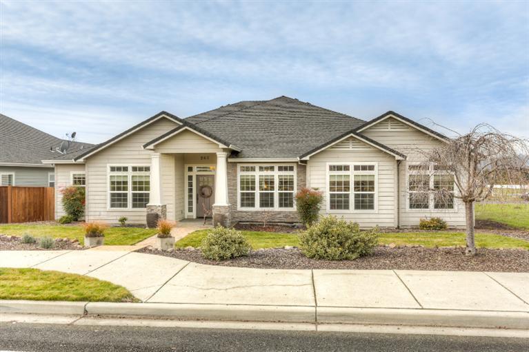 Well appointed 3-bedroom, 2-bathroom, 2,510 sq. ft. craftsman style home in the Eagle Point Golf Course Community. Built in 2004 this immaculate home features an open floor plan, vaulted ceilings, hardwood and tile flooring, granite countertops in kitchen, double ovens and cook top with custom cabinets and pantry, breakfast nook which flows into family room with gas fireplace, private front dining room, master suite with coffered ceiling, 2 walk-in closets, master bathroom with separate shower and tub, central vacuum system, covered back patio, full landscaping with sprinkler system, large attached 2-car garage with alley access all on .20-acre lot.