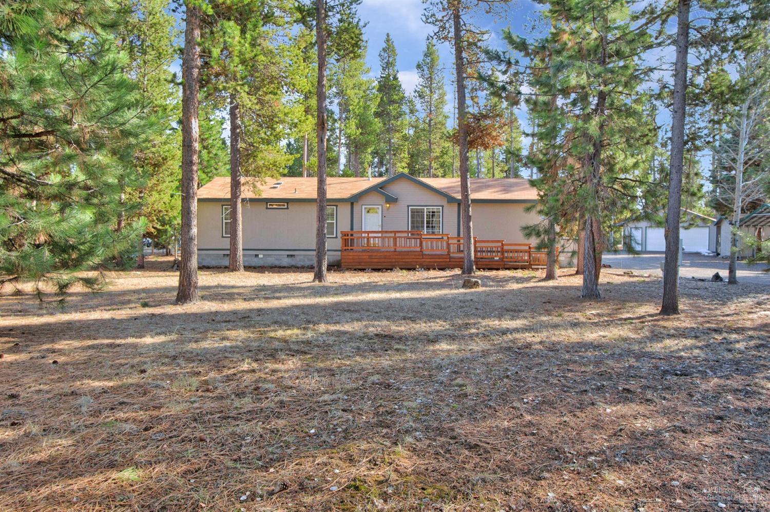 Enjoy the park like setting with this turnkey 3 bed 2 bath home on a desirable 1 acre lot just a few blocks from La Pine state park. Oversized 2 car garage, 20x30 carport, and 20x36x13 RV covered parking, multiple storage buildings, fire pit, horseshoe pit, lots of parking, and a fenced back yard are just a few of the outdoor amenities that make this property outstanding. Home is in great shape, has a brand-new roof and a recently painted exterior. Affordable living in an outdoor enthusiast wonderland with lakes, hiking, biking, hunting, fishing, camping & more.