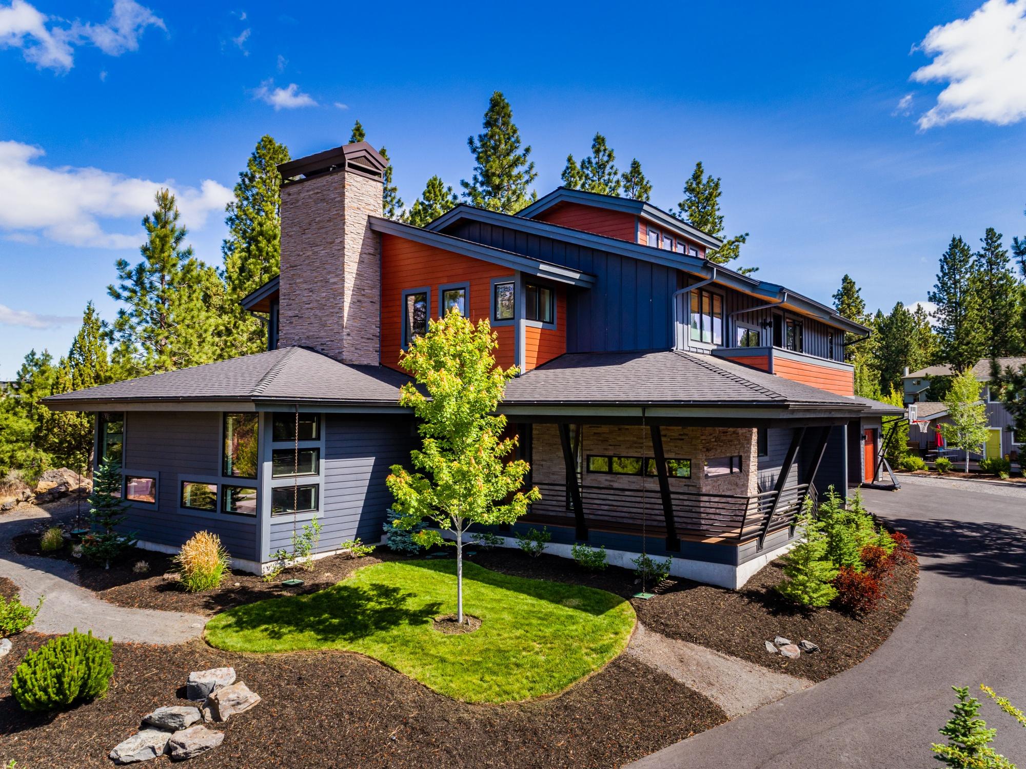 Convenient neighborhood access to bike trails out to the Phils Trail complex, close proximity to shopping, dining and schools, this custom home built by Pacwest in The Reserve has room for everyone. Perched up on the uphill side of the street offering territorial views provides a sense of privacy from your surroundings. As you enter this light filled home you'll appreciate the well appointed features including: wide plank oak floors, multiple decks and balconies,
open stair case, den/office/flex room off of kitchen area, multiple built-in bunk beds providing room for up to 8! Huge upper level master suite with a large walk in closet, double vanities, tile shower, large soaking tub, black out window rolling privacy panels and a separate flex/exercise studio within. This home is situated on an oversized lot complete with a fire pit, short term RV area with 30 amp hookups and more!
