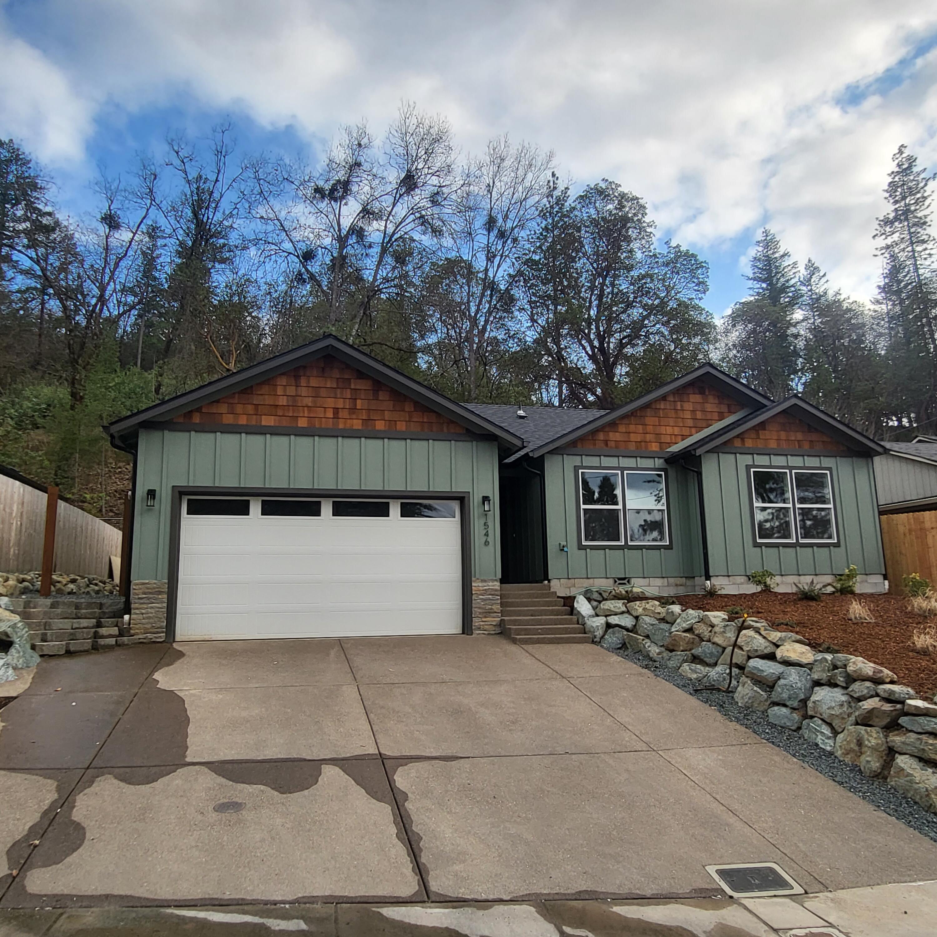 Brand new 1399 sq ft Home 3 bedroom 2 bath home in south Grants Pass. Well designed open floor plan, with Granite Counter Tops, Stainless kitchen appliances (Ref, Range/Oven/Microwave, D/W), Shaker Alder cabinets, black trim plumbing and light fixtures, LVP simulated wood flooring, LVP tiles in the laundry and bathrooms, and single panel doors. Low maintenance yard, convenient location turn key home.