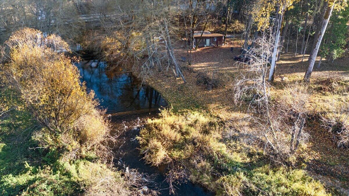 Jump on this opportunity to own your own secluded lot featuring a beautiful year-round creek! This property offers the perfect balance of privacy and convenience—just 10 miles from Seven Feathers, near a local ski resort, and only 30 minutes from both Grants Pass and Roseburg! Talk about the best of both worlds! Tall, mature trees provide a peaceful, private, natural setting. Plus, there is potential access to power, giving you flexibility for future development. Don't miss your chance to secure a little slice of Southern Oregon serenity with endless possibilities.