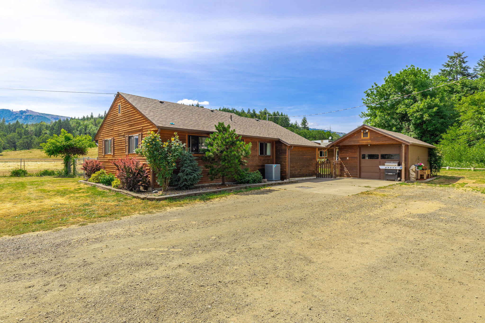 Located in the desirable Melrose area and in the heart of wine country this beautiful cottage will not disappoint.  Nestled on 8.5 level and usable acres this house is completely remodeled and ready for you to move in and make it your forever home!  There is a new roof on the house and garage as well as a new heating and air system (ducts too!).  Inside you will find a new kitchen and bathroom with custom upgrades, new paint throughout and new luxury vinyl in the kitchen, laundry and bathroom.  Through the rest of the home the original oak flooring has been refinished and brought back to its original beauty. The guesthouse is a very comfortable, remodeled studio with a kitchenette, large bathroom, new flooring and plenty of room to make your guest perfectly comfortable. On this fully fenced acreage you will find a detached garage,  barn, equipment sheds, and RV hookups!  Plenty of room for your toys,  gardens, animals  and your imagination!