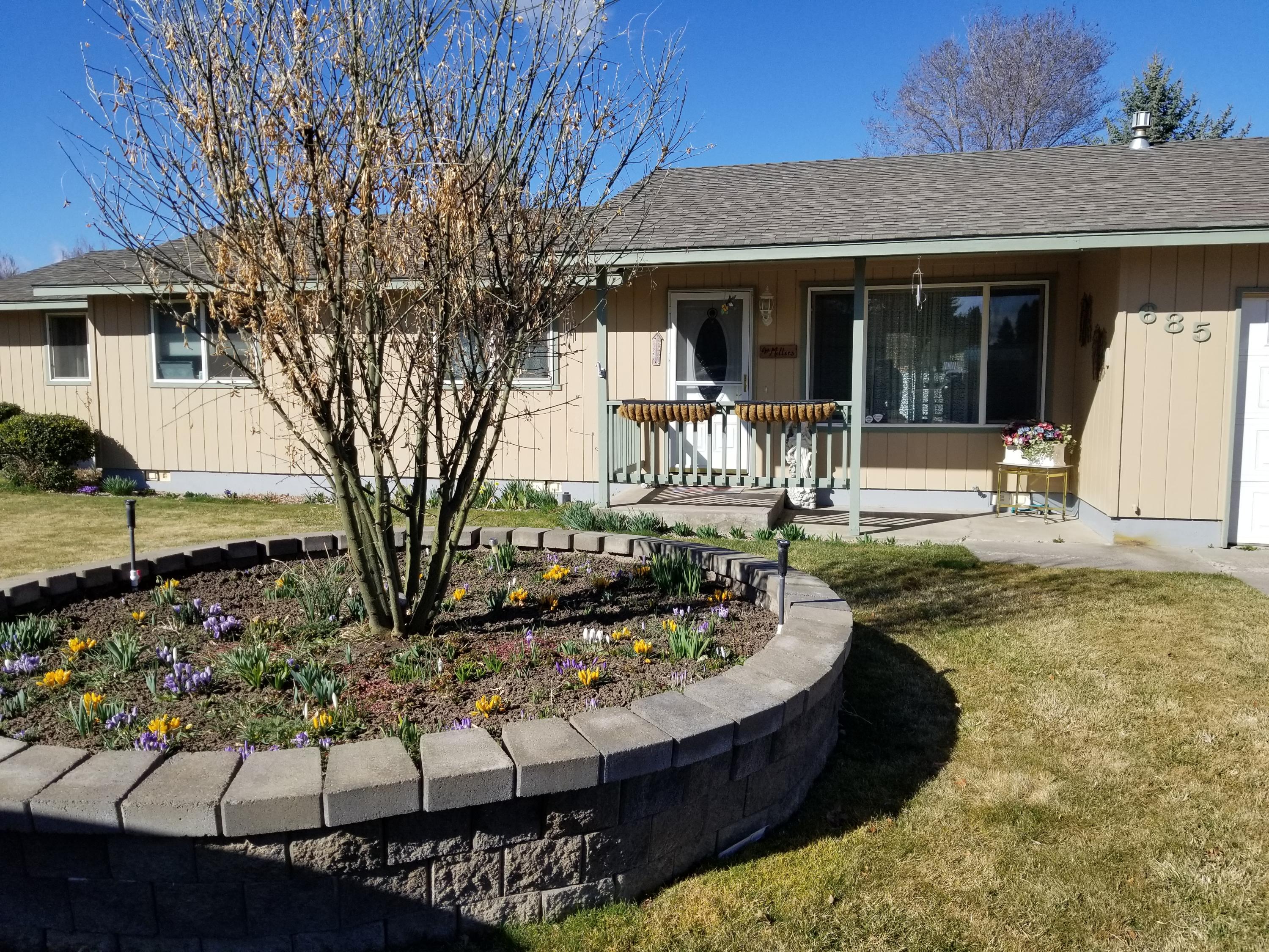 Must see! Loaded with surprises! In Town!  8 years ago fully upgraded....plumbing, electrical, Tile, flooring and appliances! 3 bd  2 and half Ba. Extra large 'Primary Bedroom'. Fenced backyard, 20 X 30 Shop with 220 plug-in. Covered Patio, underground sprinklers front and back!  single car garage. Extra parking spot,. Beautiful flowers ready to start popping up!