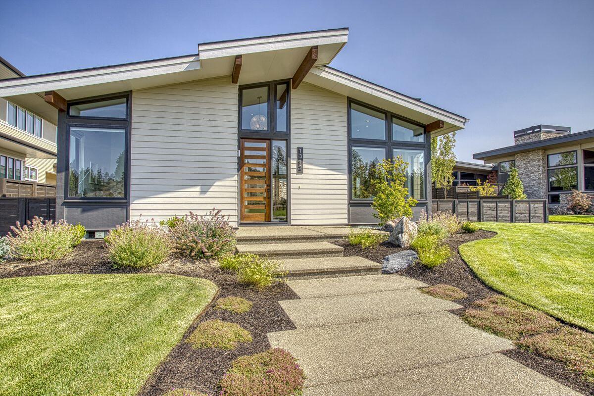 Stunning Mid-Century Modern home in Bend's most popular neighborhood, on coveted Discovery Park Drive with breathtaking views of the 35 acre park
and lake. Built by Structure Home Builders, this single level, certified Earth Advantage home was featured in Bend's Tour of Homes in 2018. Featuring an open great room floor plan, quartz ''waterfall'' island, Italian porcelain floors and 14 foot vaulted ceilings. Light and bright, this home feels like an art gallery. With hardwood floors throughout and a medical grade IQ Air whole house air filter, this home is meticulously clean and allergen free. Facing southwest, the home basks in afternoon and evening light with beautiful sunsets. 3 blocks from everything the award winning
community of NorthWest Crossing has to offer including restaurants, trails, schools, Farmer's Market and recreation. A truly remarkable home. Sold Furnished.