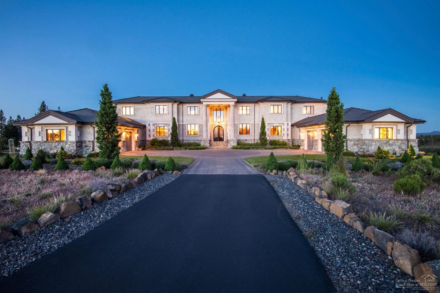 Here is a home quite like no other, built following appropriate mathematical elements in its design, harkening the builders of old, creating what is known as the natural divine proportion applied to modern architecture. Famed cathedrals & the like have adhered to these principals to inspire all those who entered & this home does not disappoint. Pavered drive is reminiscent of an Italian villa courtyard w/ authentic solid limestone columns. From a grand foyer, you can see the home is perfectly symmetrical. On main level find a chef's kitchen w/ nothing less than the finest & dining area outfitted by famed furniture designer, Robert Seliger. 2 living spaces overlook the manicured grounds & river. Office, solarium & guest suite in South wing. Down, a full Theater Rm & wet bar, atrium ideal for wine tastings, 500 SF professionally equipped wine cellar & 2nd guest suite. Atop a circular work of art staircase: upper level w/ 2 more suites, 2nd laundry & palatial master wing w/ Cascade views.