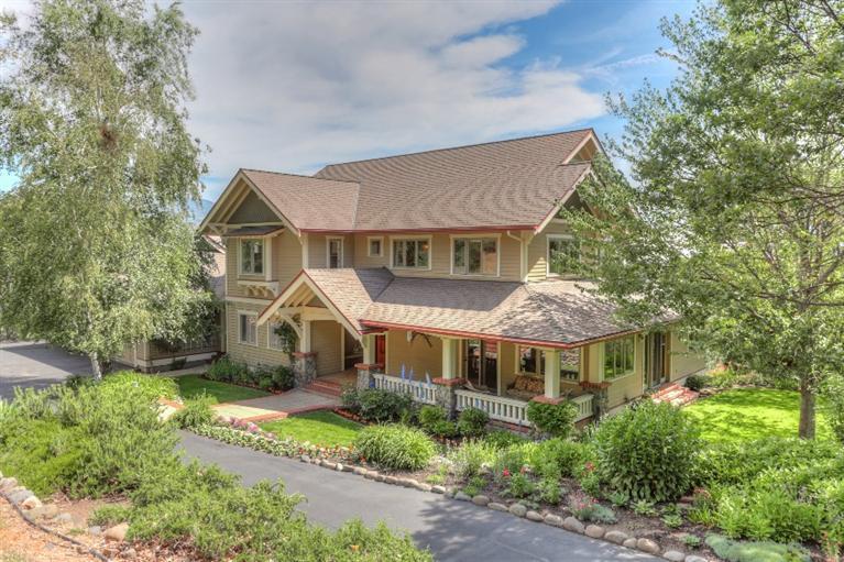 A rare offering in the desirable, close in, Morninglight area, this Craftsman home, built by the Shostrom Brothers, combines quality construction with gracious, rural living. This 5 bedroom, 4-bath home boasts cherry cabinetry, hardwood and ceramic floors, crown moldings and 9' ceilings. Main level offers a spectacular chef's kitchen with box-beam ceiling, granite counters, Wolf cooktop, large island and charming upholstered breakfast nook. Family room has 2 built-in desks, bookshelves, several cabinets and access to grassy side yard and front porch. Formal LR with fireplace, French doors to wrap-around deck, panoramic valley views, access to garden paths and Boules court below. Main level bedroom is adjacent to bath and generous tiled laundry room. Upper level features private master suite with fireplace, walk-in closet and an all travertine bath with heated floors. Three additional bedrooms, two with ensuite baths and one with access to finished attic. 3-car garage with workbenches.