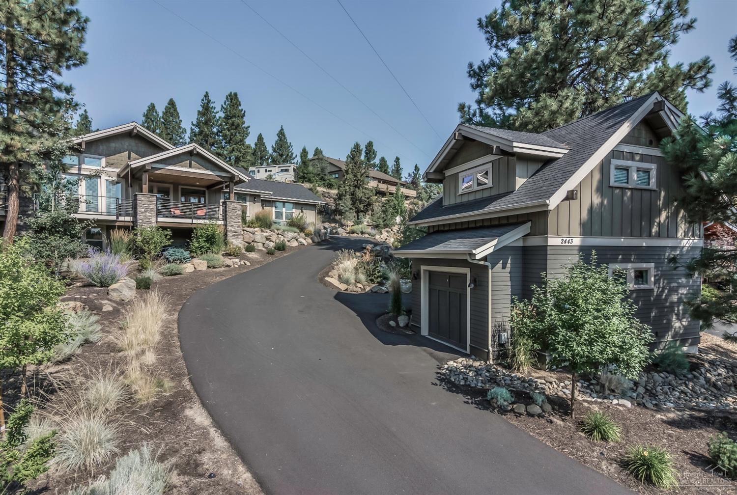Stunning mountain modern home with open concept and expansive outdoor living space. Chef's kitchen, spacious dining room, vaulted living area accented with clean color palate and warm woods. Single level living with main floor master and office or 4th bedroom. Bonus room and 2 beds on the lower level. Property features the only permitted accessory dwelling unit and fully permitted STR in Shevlin Ridge. Income with Airbnb, mother in law suite or home office. Just steps away from Shevlin Park.