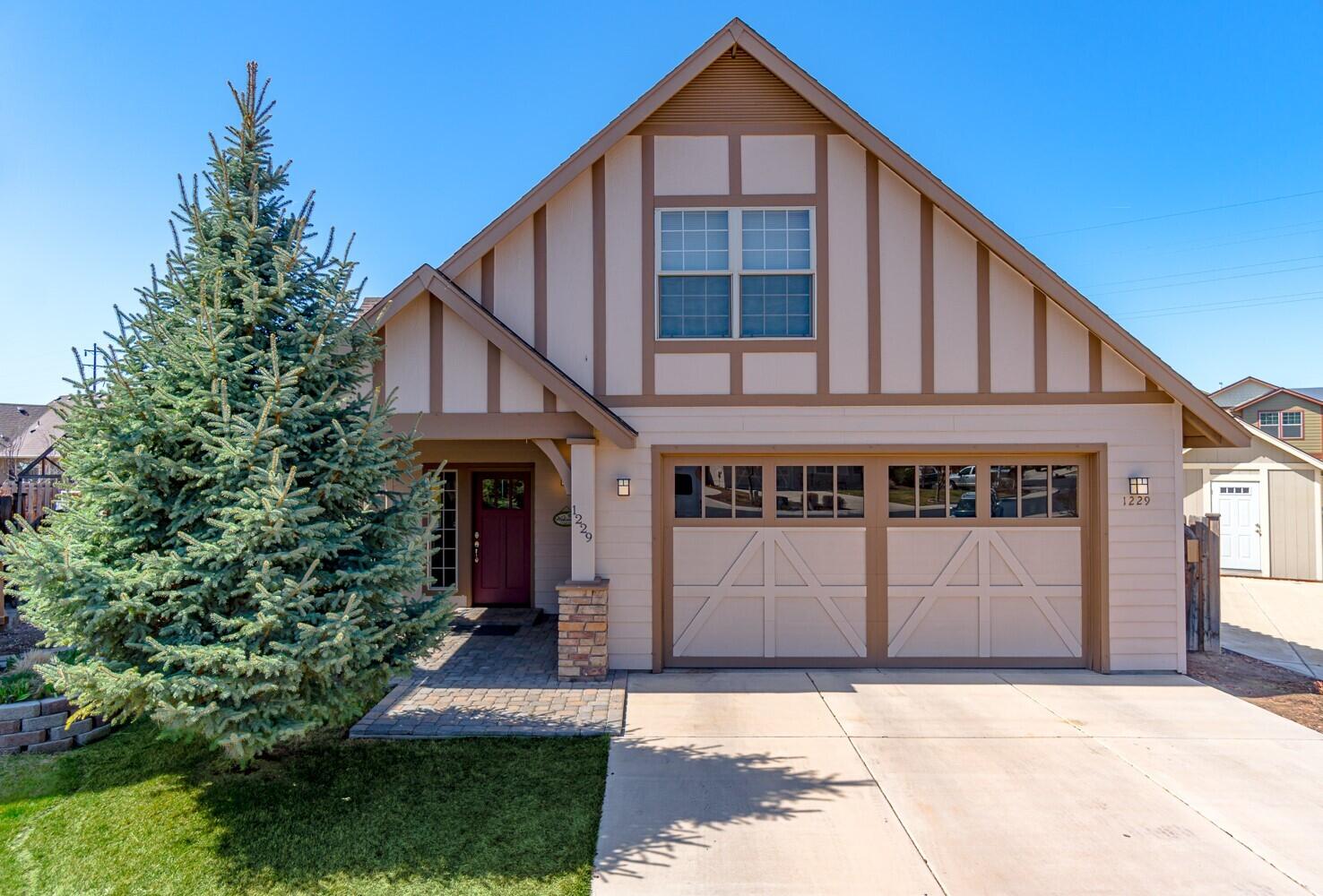Conveniently located in SW Redmond on a quiet cul-de-sac w/ covered paver patio entry. Spacious entry leads to a vaulted Great Room w/tons of natural light throughout. Custom wainscoting accents, laminate floors & neutral paint colors. Open layout w/dining area, tiled corner gas burning fireplace & sliding doors leading out to the patio. Kitchen offers a breakfast bar/central island w/tile countertops. Vaulted Primary bedroom on the main level w/ double vanity bathroom & walk in closet. Peek a boo views to the Cascades. Second bedroom on main level, full bathroom & an open office/den area too! Stairs lead to a bonus/media room w/ third bedroom on upper level. Laundry/mud room off the double garage. Step outside to the expansive covered paver patio & landscaped backyard perfect for year round enjoyment.  Backyard features ready to plant raised garden beds off to the side, woodshed, & front/rear sprinkler system. Open house, Saturday 4/10 from 11am-4pm & Sunday 4/11, 1pm-4pm.