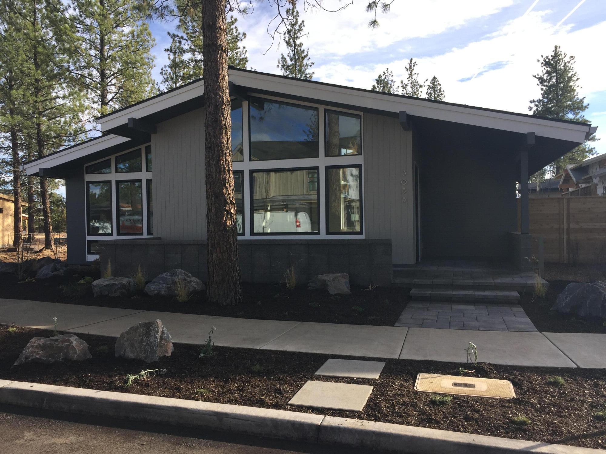 Another fabulous Hasenoehrl Custom Home in Bend's desirable Discovery West neighborhood. Mid-Century modern, single-level design with soaring ceilings and beautiful high end finishes. Big windows bring in much light and a very private courtyard makes for a lovely outdoor space for entertaining. High end appliances are part of the package and the yard is fully fenced and landscaped.