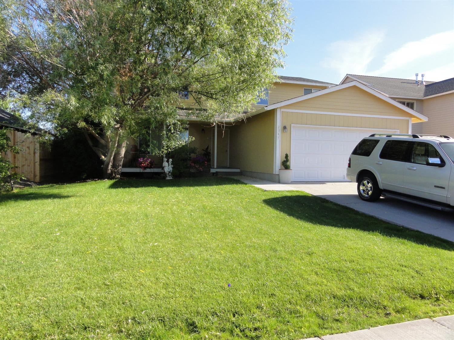 Immaculate, large Craftsman style home on over 1/4 acre lot w/attached double garage AND a detached 576 sq ft shop + 8x20 shed. Light & bright home w/oversized windows. Breakfast bar & newer stainless steel appl. Living room has great room concept + separate bonus room. Mature trees, fenced including 12' RV gate & plenty of room in rear yard for RV's. Raised garden beds, automatic underground sprinklers front and rear, covered porch q/Trex decking. The home is very well insulated. Near schools & shopping
