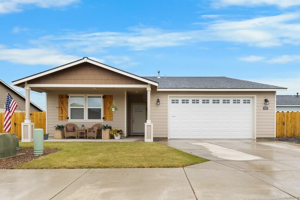 Craftsmanship throughout this better-than-new 4BR/3BA home in SE Madras—just minutes from downtown! Enjoy dual primary suites, mountain views, and spacious indoor/outdoor living perfect for entertaining. The open great room features a gas fireplace with custom tile, hardwood floors, and premium finishes. The kitchen offers granite counters, travertine backsplash, island with bar seating, stainless appliances, and a dining area with patio access. Main suite has step-in shower and walk-in closet; 2nd suite includes tub-shower and walk-in closet. Two additional bedrooms—one used as an office—share a full bath. Laundry/mudroom has built-ins and adjacent large utility closet. Home includes gas forced air, central A/C, 6' cedar fencing, landscaped yard with sprinklers, back patio, RV parking, and a 2-car garage.