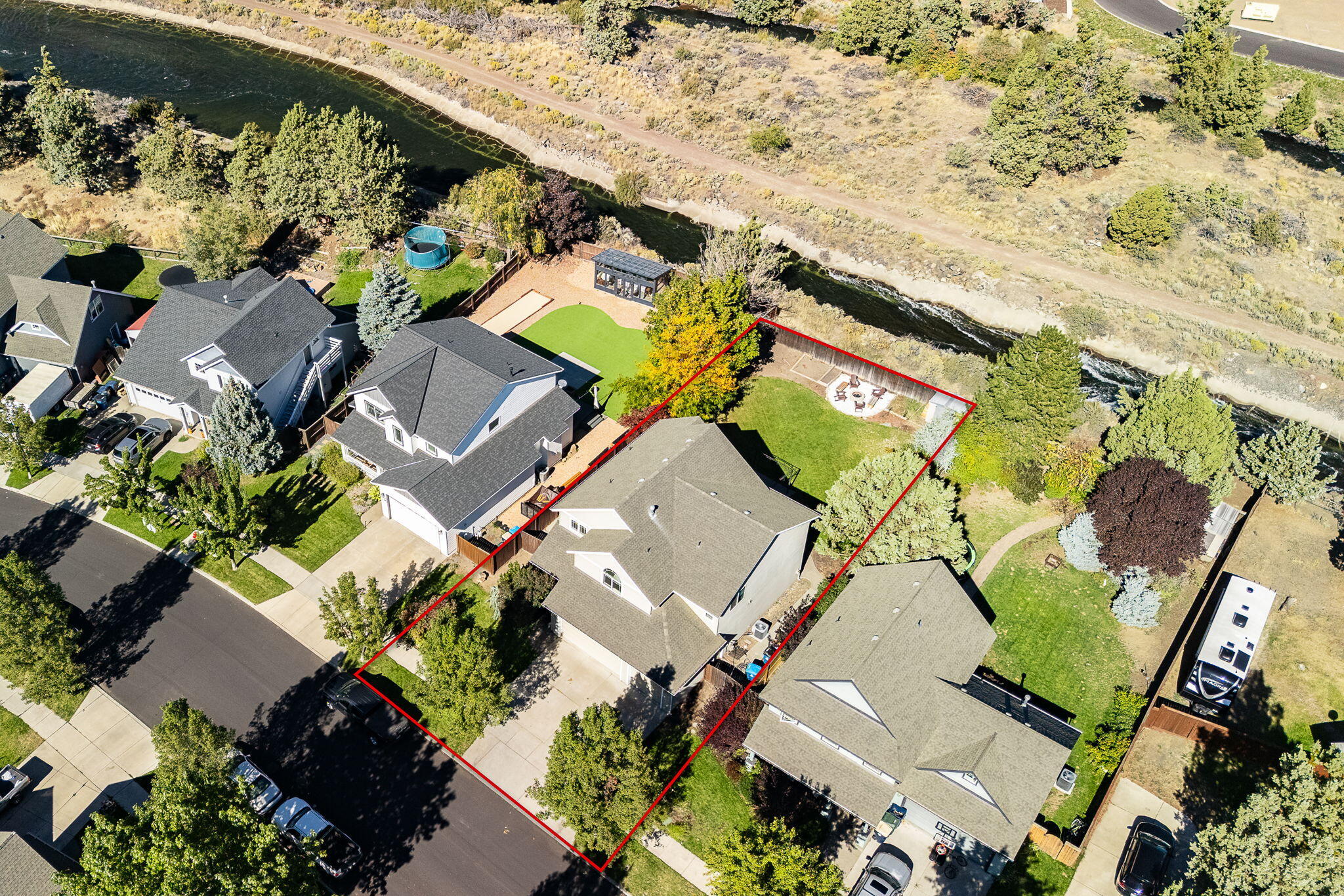 Your next home is located on a tranquil street with nothing behind it but an irrigation canal. Experience space and privacy in this oversized backyard, and convenient setting.

The home features 3 bedrooms, an oversized bonus room and an office. The 3 car garage and flat driveway allows for plenty of toy and vehicle storage.

The downstairs features an open setting and real hardwood floors. Upon entering the foyer, you'll find the office, and pass through the classic columns into the dining room, kitchen, and cozy living room with a gas fireplace, and easy access to the backyard. 

Upstairs offers a spacious primary suite with vaulted ceilings a jetted soaking tub, along with 2 other bedrooms and the bonus room.

The home features fresh paint inside and out, new carpets throughout, and original hardwood downstairs and Moroccan Cherrywood in 3 rooms, along other upgrades. Ask your realtor for the updates list, and schedule a showing today!