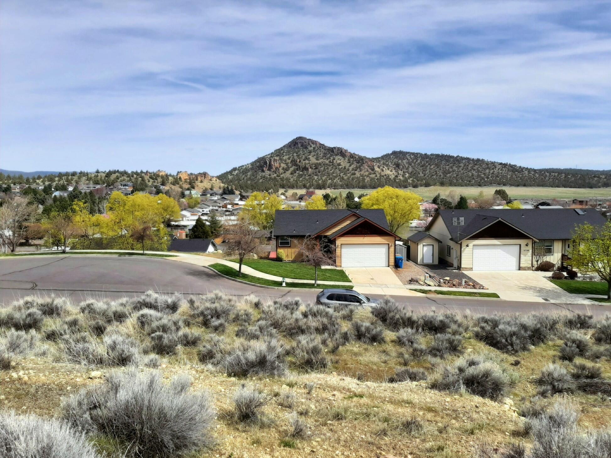 1 acre in town! Could be 4 lots. Power at the lots, city water and sewer available according to the planning department. At the end of Bobbi Court - a neighborhood of very nice homes on a quiet cul-de-sac. Potentially outstanding views of Barnes Butte depending on home placement. Just minutes away from shopping, dining, and recreation, this is a really desirable place to build a home OR a few homes. Attention builders and investors! Owner is open to looking at owner carry financing. Great opportunity - come take a look!