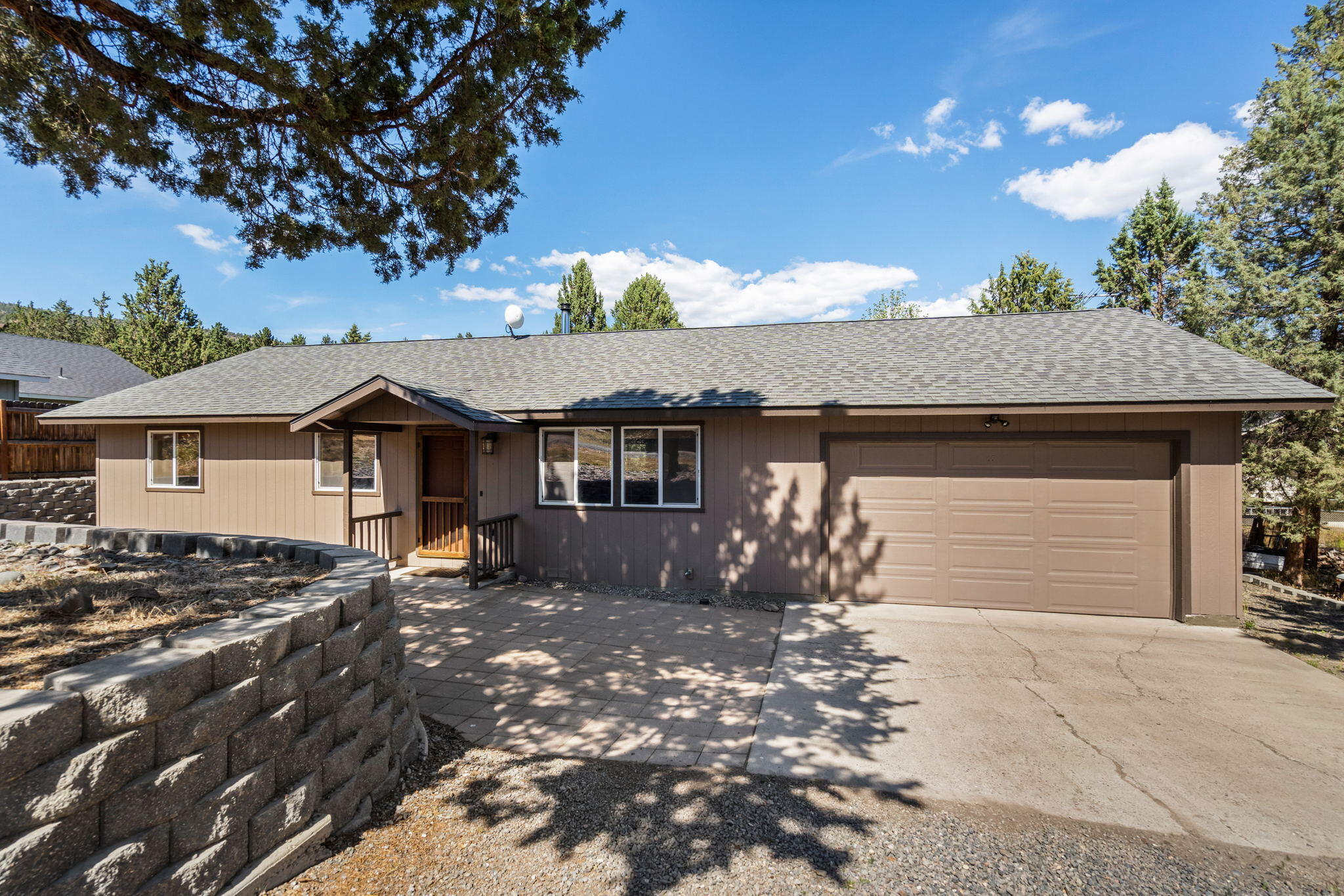 Great home located in Ochoco West. Open floor plan kitchen, living and dinning with new flooring throughout. Well maintained 3 bedroom 2 bath home with RV parking and wired for 220 in the shop. Enjoy a nice wood burning fireplace during those cold winter nights. Amazing backyard  with raised garden beds, large concrete patio, hot tube pad w/power and completely fenced.Ochoco West offers a year round fishing, shooting range, seasonal pool, horse stables, RV storage and access to over 1200 acres of private land with trails to hike or ride your ATV.