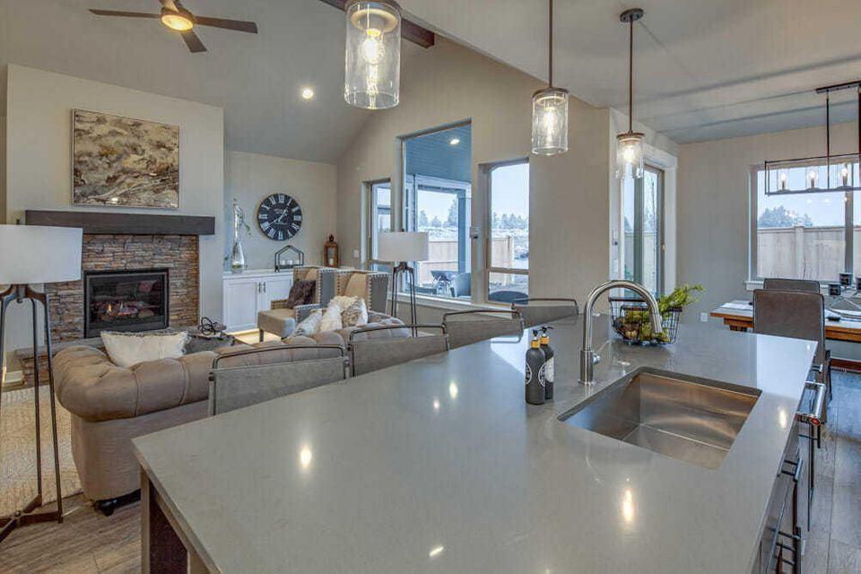 This beautiful Wentworth floor plan is presented by Award Winning builder Pahlisch Homes. Located on Bend's prestigious northwest side. Those living here are in close proximity to the Bend Park and Recreation District river trail, shopping, Sawyer Park, and have quick access to the rest of town. 

Homes in this community are crafted with integrity and quality in mind. They include high-end features like nine-foot ceilings on the main level, Santa Fe wall texture, custom built-in cabinetry, and smart home integrations.

This homes quality & finishes will be the envy of family & friends.  2,149 SF single level home will delight all the senses with the natural light in it's beautiful chef's kitchen, dining and great room. Relax in the Gracious master suite with large walk-in closet, tile walk-in shower , dual vanity and soaking tub. Den.   Photos are of similar home.