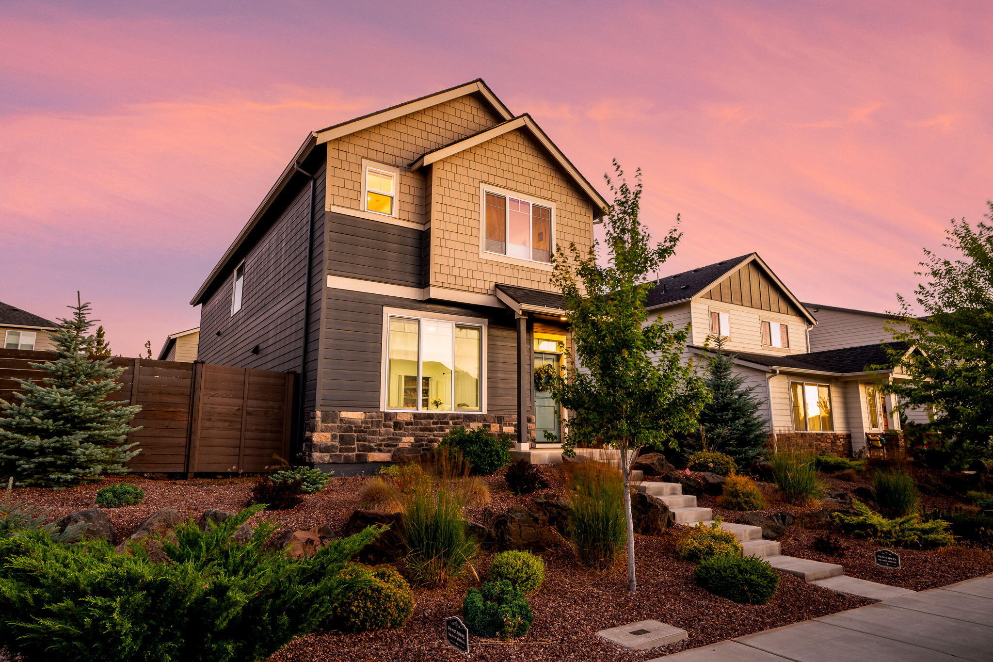 Looking for the best $520K home in Bend? You just found it. This updated 3-bed, 2.5-bath home with usable landing space blends comfort, style, and convenience. Enjoy fresh paint, new LVP flooring, all-new carpet, matte black hardware, and a brand-new A/C system for year-round comfort. The open great room is perfect for gatherings, while the landing adds flexible space for work, play, or fitness. A soothing designer palette, oversized primary closet, and large windows fill the home with warmth and natural light. Step outside to a shaded, fully fenced backyard that's ideal for pets, play, and summer dining. Located just blocks from a newer elementary school and neighborhood pool, with easy access to shops, trails, and dining. Extras include rear alley garage access, HOA-maintained front yard landscaping, snow removal, and smart home features. At this price, it's one of the best values for a primary home in Southeast Bend — move in and make it yours.