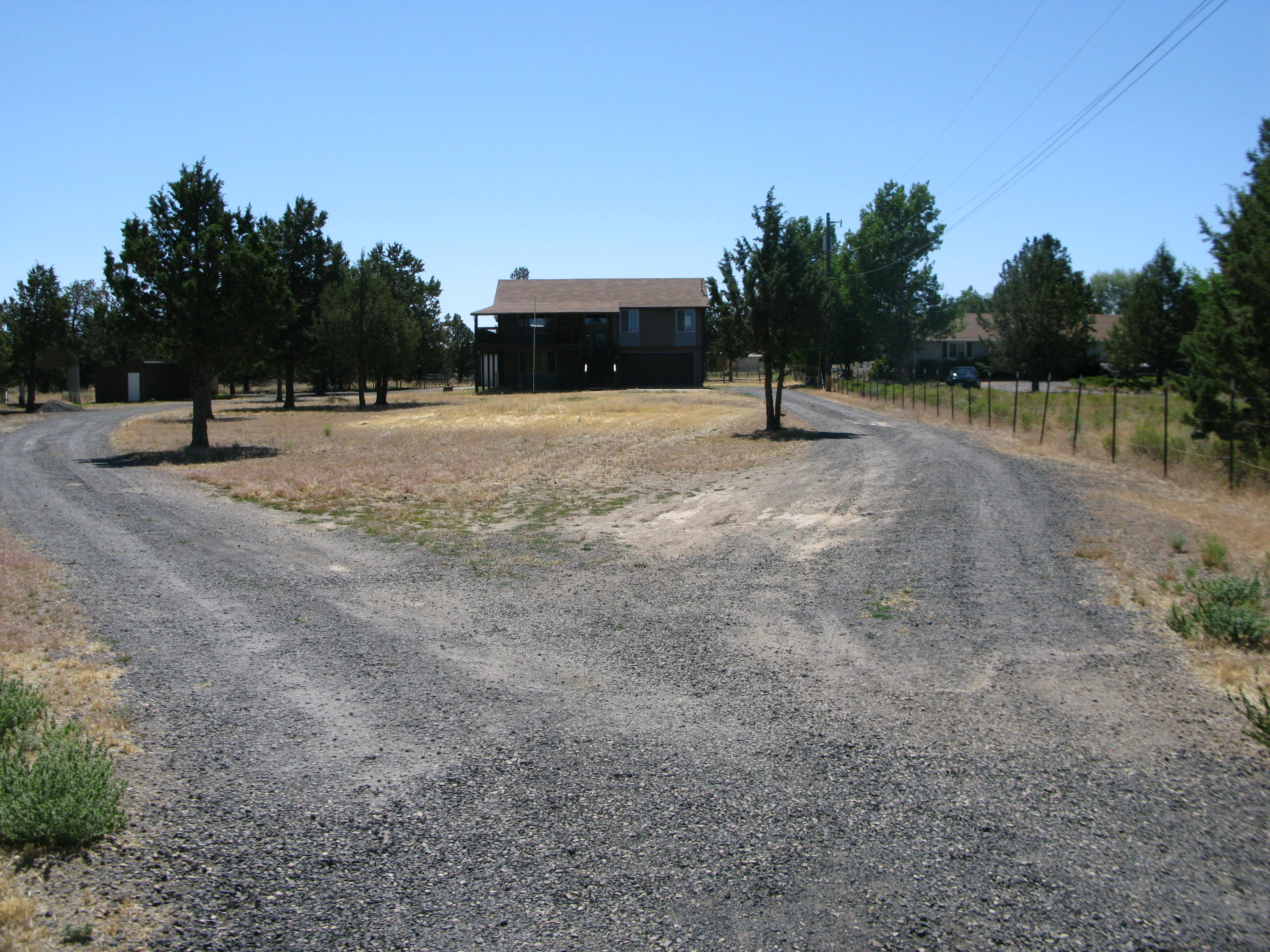 Large Home on 1.3 acres. This 3 bedrooms, 3 full bathroom home has plenty of room for everyone. With a large living room, open kitchen Induction range top and oversized dining area!<div>Master suite has an incredible walk in closet, with a vast array of storage!</div><div>Roomy shop that is 1728 sq ft. with concrete floors. The property is fully fenced as well. This home boasts reverse living, with lots of windows!<div>HVAC system is ductless with units upstairs and down stairs. Wired for sound, this home is great for entertaining! Home also has an unfinished bonus room off the back deck that has a beam in the wall and room can be opened and expanded if buyer desires! .</div><div><br></div><div><br></div><div><br><div><br></div></div></div>