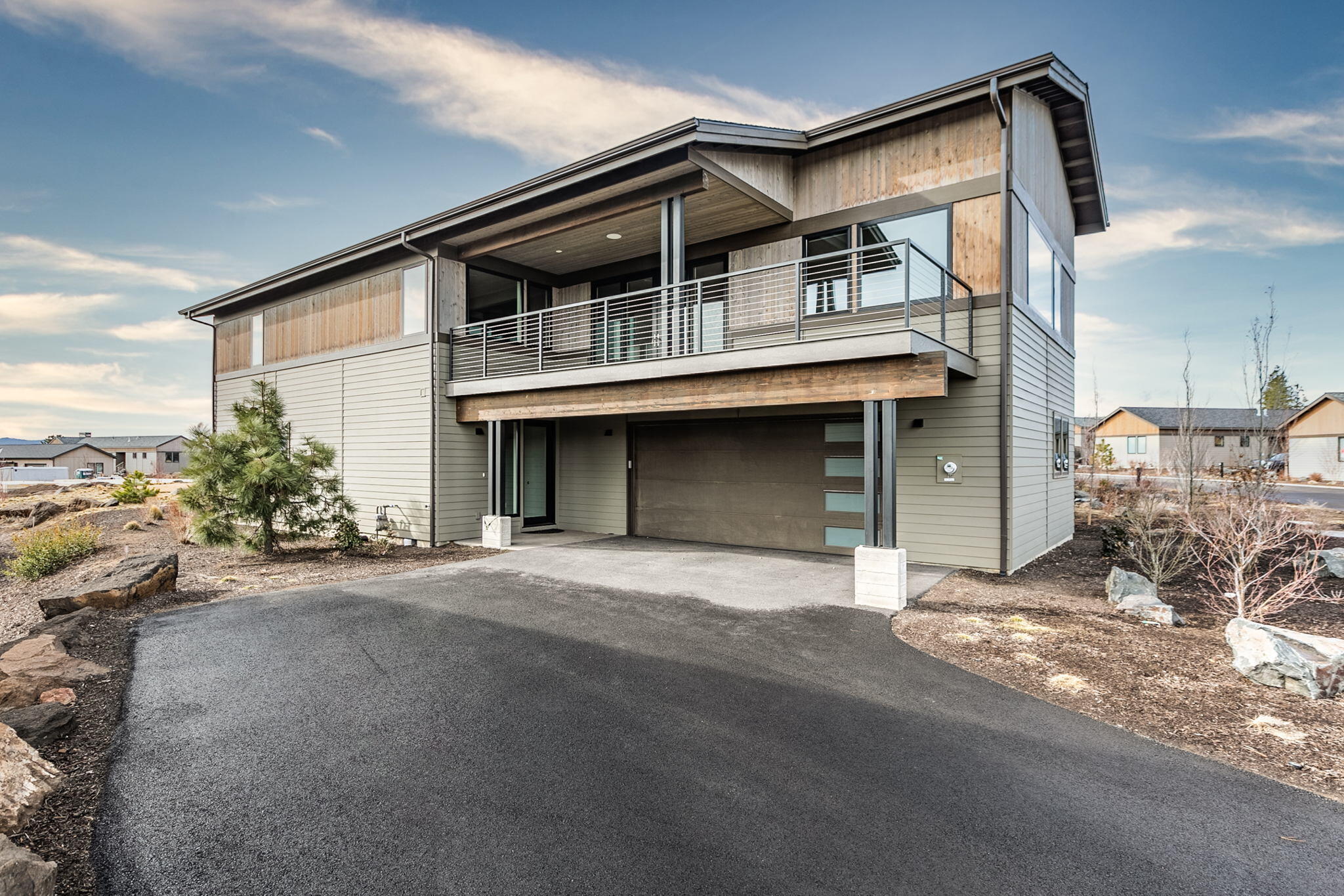 This luxurious BendTrend home in the golf community of Tetherow allows you to be 20 minutes from Mt. Bachelor and the Cascade Lakes while still only 4 miles to downtown Bend. Just down the street you'll find a sports center, two high-end restaurants, two pools, and an award-winning 18 hole golf course. This reverse living 2,975 sf home boasts 4 spacious bedrooms, 2.5 bathrooms plus a private study off the upstairs master. The thoughtful modern finishes throughout include hardwood floors, quartz countertops, fully tiled showers, high-end stainless appliances, and a Sonos home system. There is plenty of room in the oversized garage to store all your Bend toys. This low-maintenance lock-and-go home exudes opulence and style. Take advantage of the Tetherow lifestyle and be a part of this highly sought-after community.