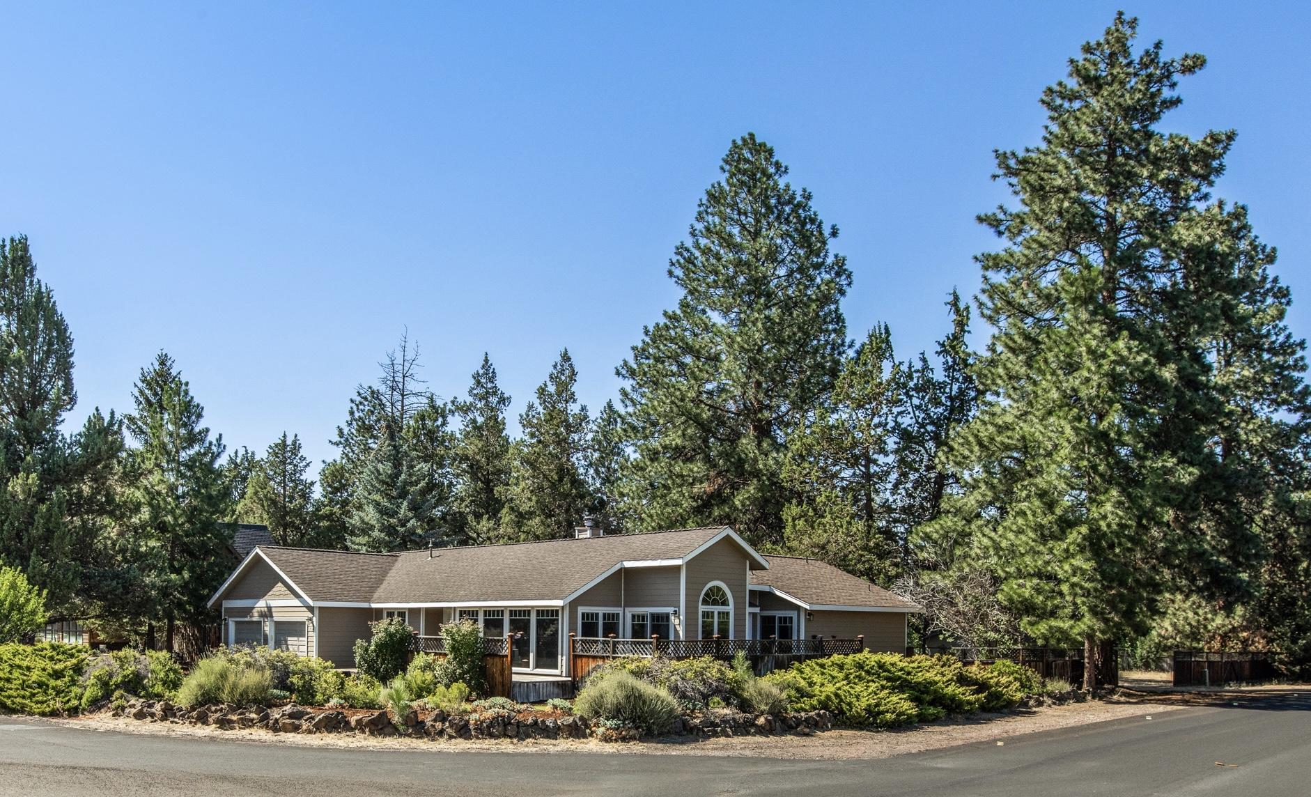 Amazing opportunity to own this beautiful property with loads of additional potential. Just under 1/2 acre, corner lot with undeveloped land to the south and east. Less than a half mile to the new high school, Caldera, and the new 37-acre Alpenglow Community Park. This single level home features 3 bedrooms with a 4th bedroom that acts as a wonderful home office. Extensive cabinetry for the ultimate craft room in another bedroom. The living, dining area and kitchen are all open with vaulted ceilings and a cozy gas stove. Solid Silestone counters, cherry cabinets with pullout drawers on lower shelves, and stainless appliances in kitchen. Family room gives extra living space. Newer siding. Oversized garage is double deep on one side and is built out with workbenches and shelving. Pull down stairs to lots of attic storage. 10x12 solidly built storage shed.