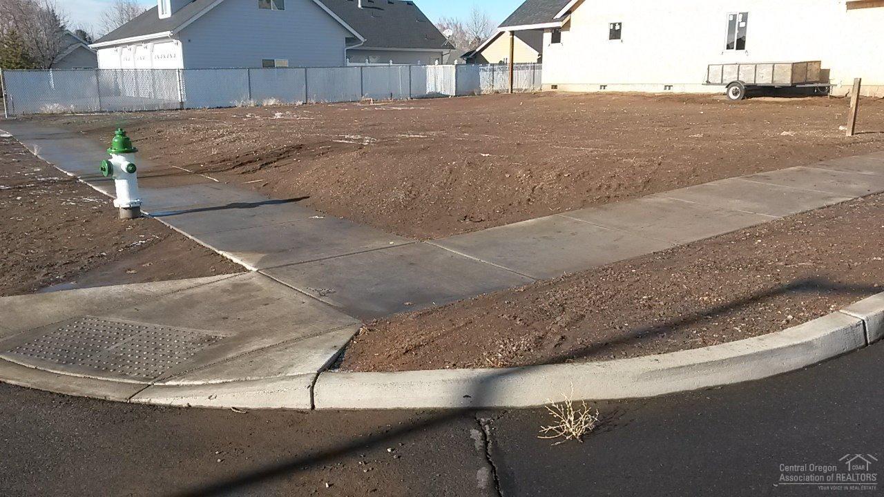 Great corner lot in the Ironhorse Development Phase 1 on the north end of Prineville. This is in an area of beautiful newer homes. The property is located close to the new grade school, shopping, parks and trails. All utilities are in the street to the lot. Call for additional information.