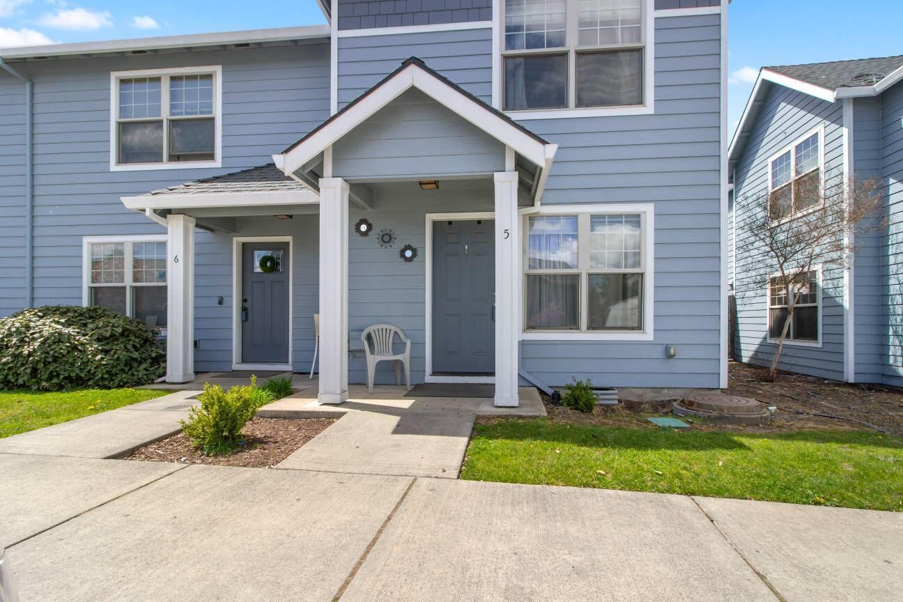 Well kept townhome in the Midway Townhome community. Located close to shopping and I5. The 3 bedrooms and full bath are upstairs.  Downstairs is the 1/2 bath convenient for visitors.  The laundry is close to the kitchen for multitasking.   Coat closet is located close to the front door for easy access.  Outdoor patio offers privacy, along with a small storage closet. This unit is an end-unit. Schedule a showing today!