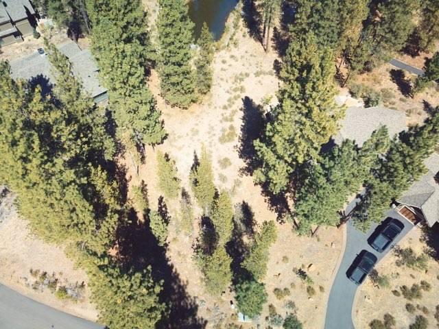 Quiet location with western views of sunset. This lot is located towards the top of the loop giving you a quiet place to call home away from the hustle.  Amenities include the Quarry Pool and Fitness Center, acres of lakes for fishing, canoeing, kayaking and miles of trails all out your door.