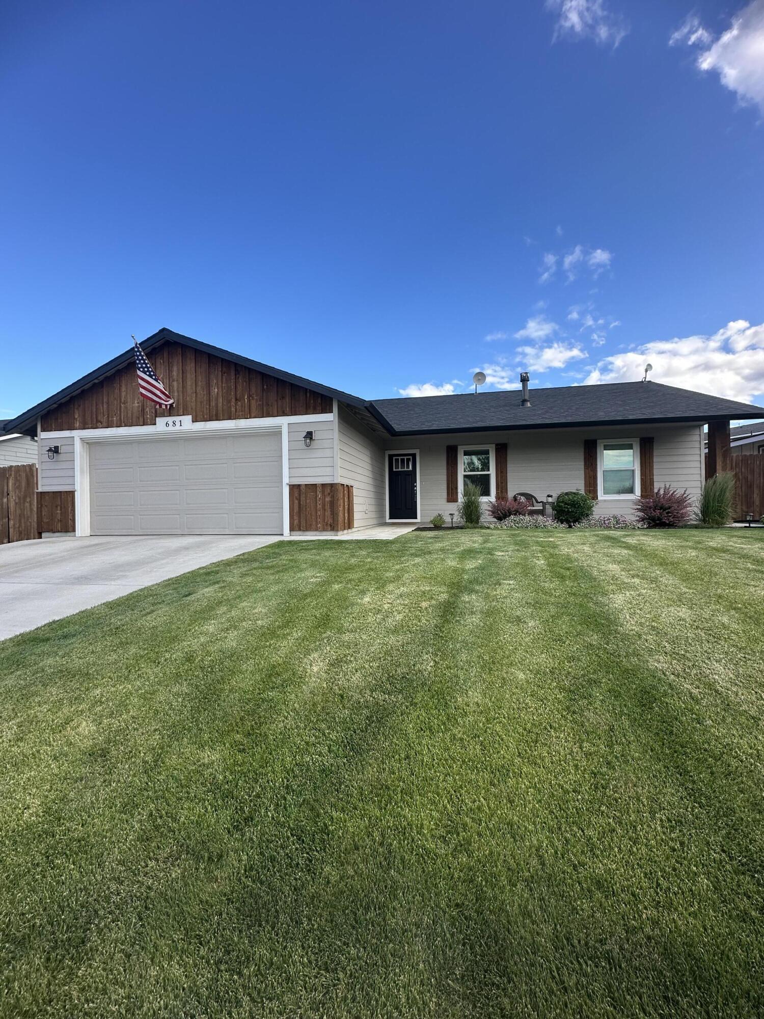 Motivated Seller
This beautifully lightly lived in home offers the perfect blend of charm, comfort, and functionality! Enjoy the bright, open-concept living space with vaulted ceilings, a cozy gas fireplace, and stylish finishes throughout. The kitchen boasts granite countertops, custom wood cabinetry, stainless steel appliances, and a stunning tile backsplash.

Step outside to a perfectly manicured yard with a welcoming covered front porch and lovely curb appeal. Located in a quiet neighborhood with pride of ownership, this home also features a spacious two-car garage, laundry room, and modern touches from top to bottom.

Separate fenced yard for animals.
Natural gas furnace, hot water heater, fireplace.