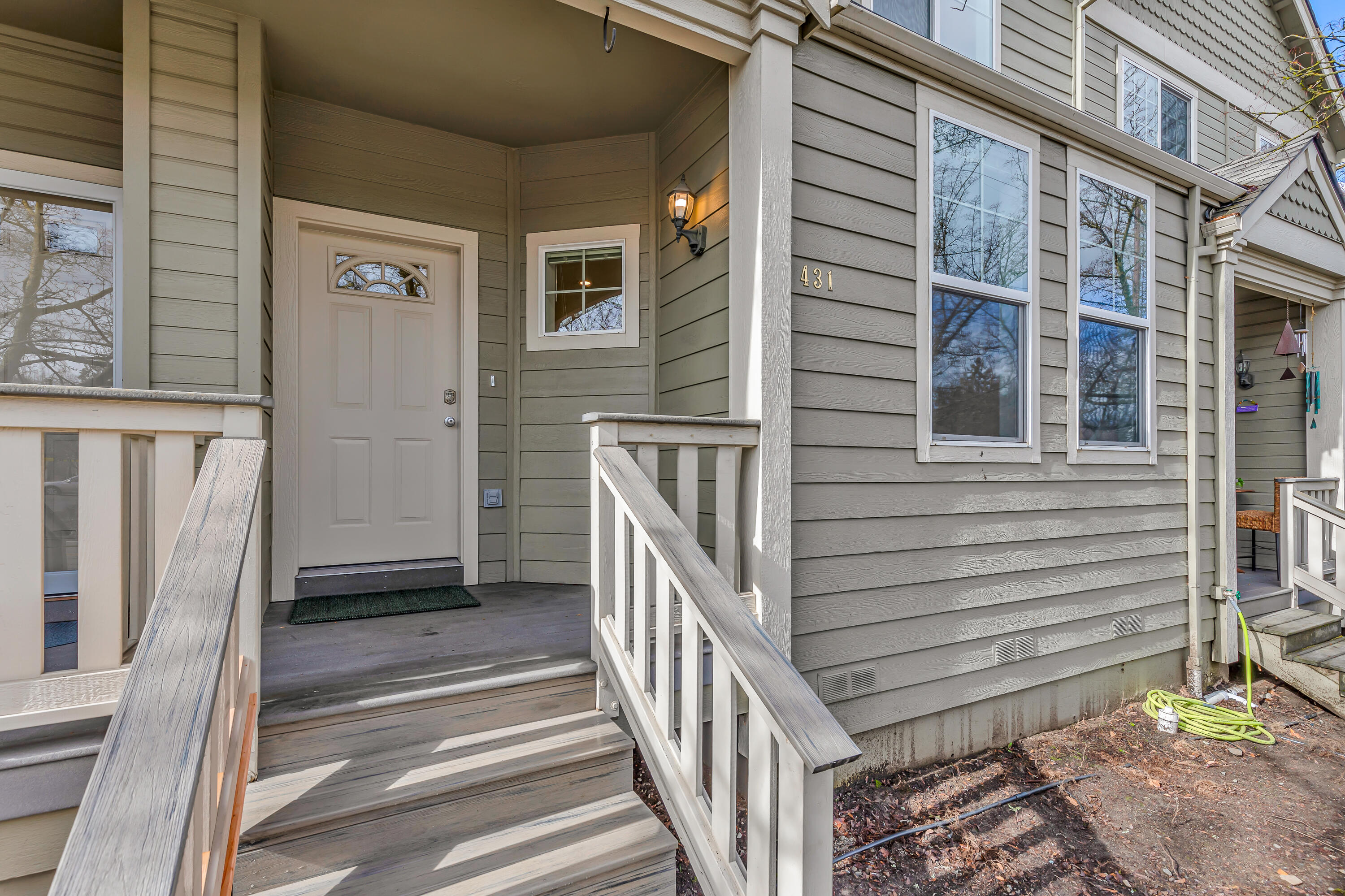 Well-maintained townhome directly across from Ashland's 40-acre North Mountain Park, centrally located within five minutes of shopping, dining, schools, and downtown entertainment! Main level with rebuilt steps to covered front entry, new waterproof vinyl plank floors, updated lighting, open living and dining, kitchen with oak cabinets, double sink, dishwasher, electric range oven, refrigerator, powder room with pedestal sink, and one-car garage. Upper level with all new carpet, spacious landing office or media area, vaulted primary suite with ceiling fan, walk-in closet, full ensuite bathroom with shower, vaulted guest bedroom with closet, full guest bathroom with tub shower, and laundry closet with washer and dryer included. Private fenced yard across from common area with seasonal creek. Association dues of $422 per month cover all exterior maintenance including siding, paint, roofing, common area landscaping, reserves, and insurance for Mountain Creek Estates. Inquire for details!