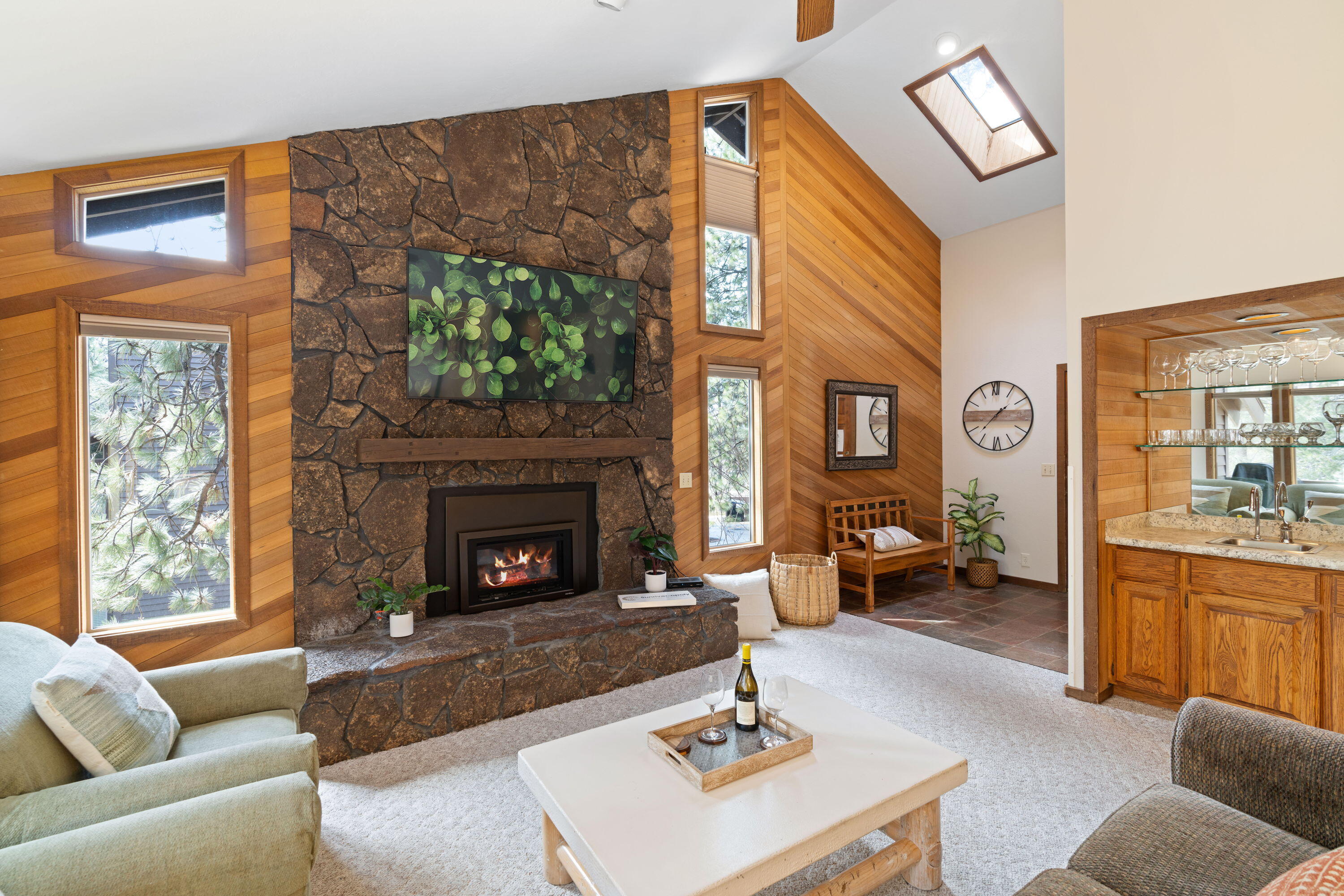 TURNKEY property! Perfect second home or investment opportunity. Don't miss this rare opportunity to own this beautifully appointed upstairs condo at The Ridge. Open floor plan with gas fireplace framed by a stunning basalt hearth. Enjoy the natural beauty of Sunriver. The Ridge offers fantastic amenities, including seasonal swimming pool, year-round hot tub, clubhouse and sports court. Nestled near the breathtaking Cascade Mountains, Deschutes River and pristine lakes. Purchase the SROA membership card ($95 for 2026) gives you access to the SHARC pool and members only lounge & gym; the marina, north pool and discounts throughout the Sunriver. This condo is an ideal retreat for outdoor enthusiast. Rentable short-term or long-term; service-dogs only. Lock & Leave convenience. Smoke-free property. Make this Sunriver escape yours too!