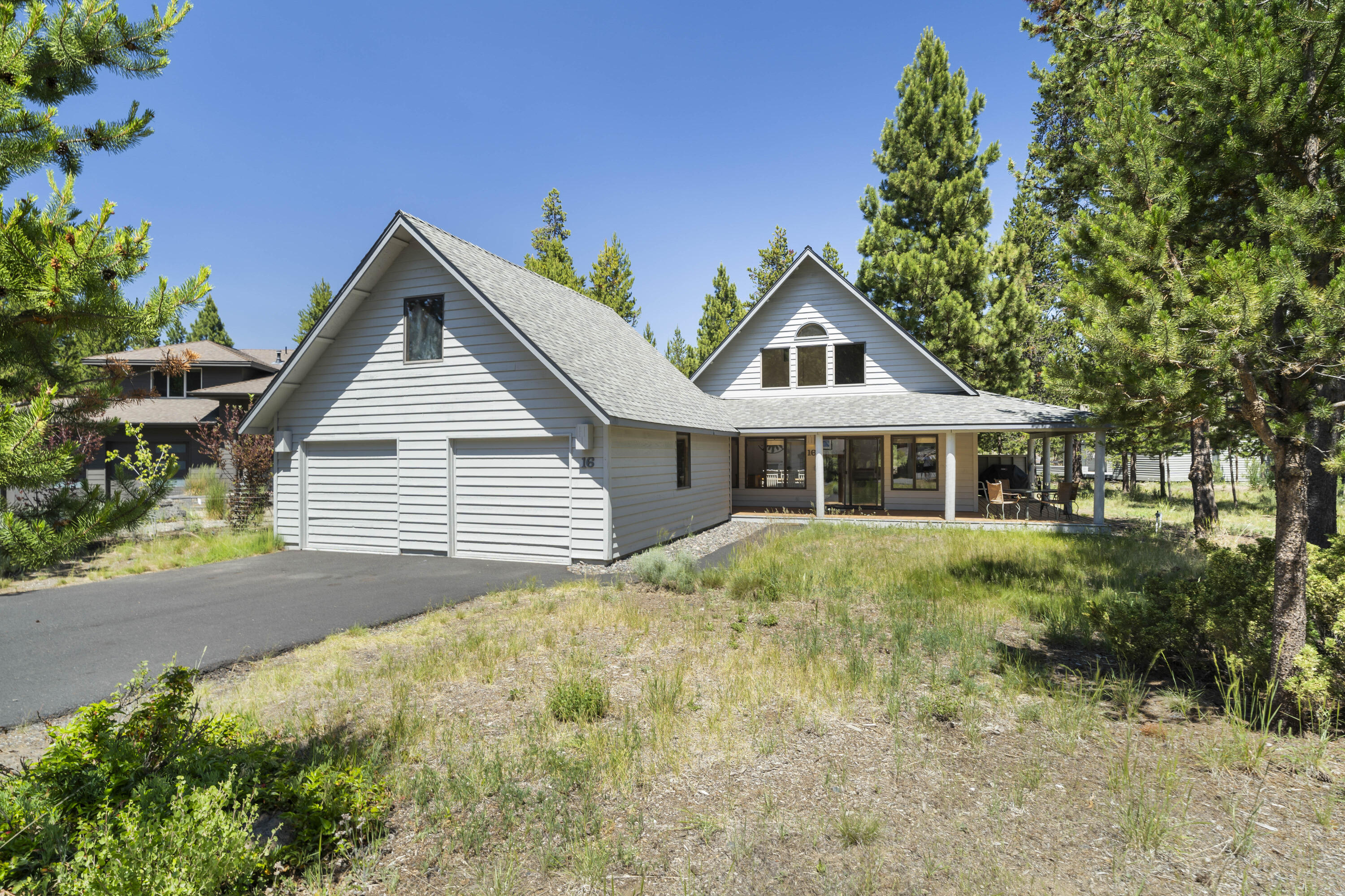 Tucked beneath the towering pines on the North end of Sunriver, 16 Modoc is the perfect blend of rustic charm & modern comfort. This recently renovated 3-bedroom, 2-bath cabin offers a warm & welcoming retreat, ideal for relaxing getaways or as a vacation rental. The open great room floor plan features a cozy wood-burning fireplace, perfect for gathering after a day of adventure. Thoughtful updates include newer appliances, furnace, A/C & blinds, remodeled bathrooms & updated blinds throughout. The main level offers 2 comfortable guest bedrooms & a full bath, while the spacious & private primary suite is located upstairs. Step outside to enjoy the wraparound covered deck & unwind in the private hot tub surrounded by tall pines. A 2-car garage w/ a secure storage area provides ample space for all your recreational gear. Ready for your enjoyment, this home is ideally located close to North end amenities w/ easy access to the Cottonwood entrance and just 15 minutes to Bend.
