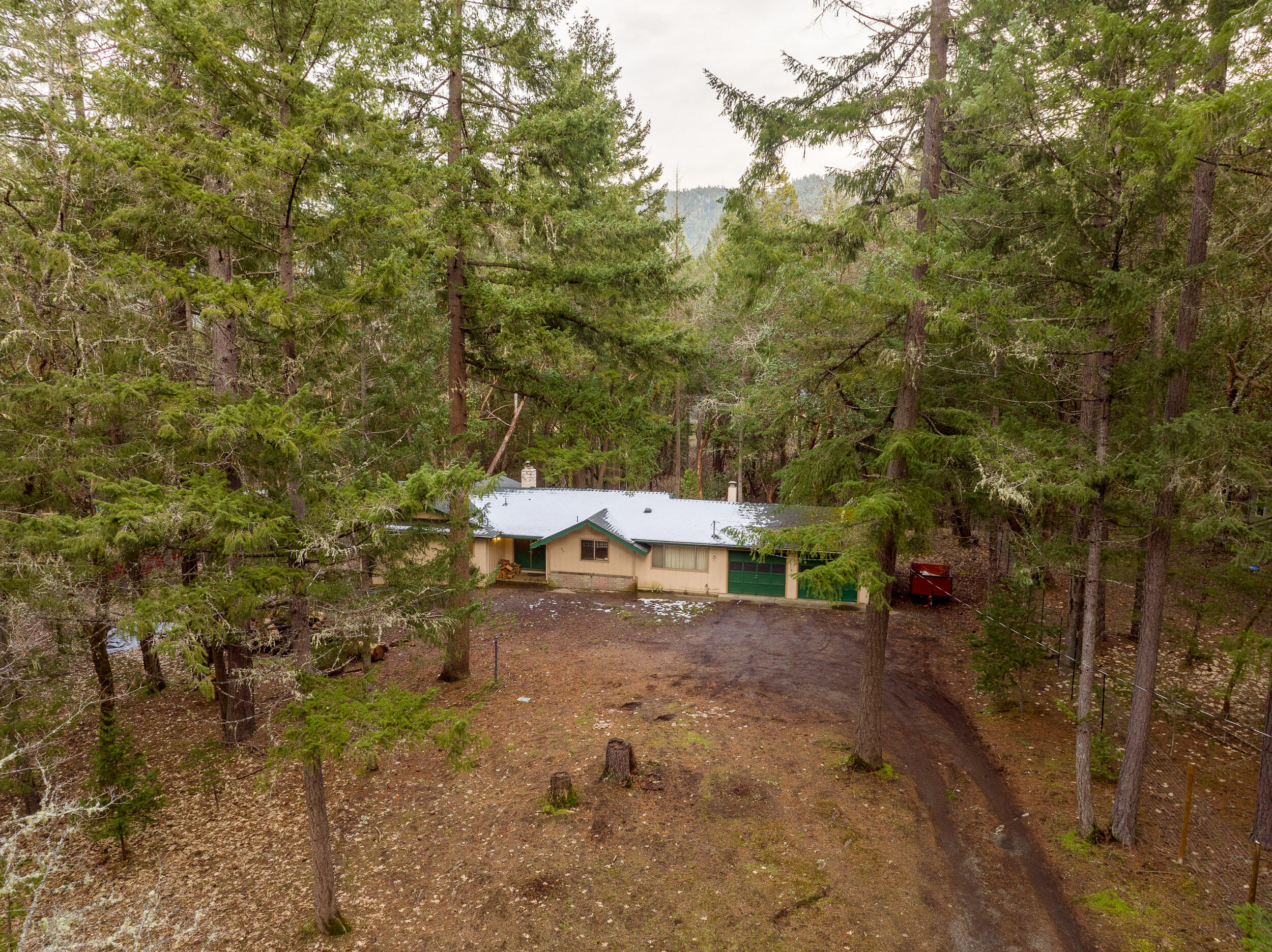 Welcome to 350 Surrey Drive! This well maintained 1736sqft ranch style home offers 2 bedrooms, 2 bathrooms, large living room, dining room, large kitchen & potential for a 3rd bedroom! Some interior features  include new paint, flooring, & German smeared fireplace. Exterior features include peaceful 1.19 acres, fully fenced, covered patio, & a seasonal creek! This one won't last long!