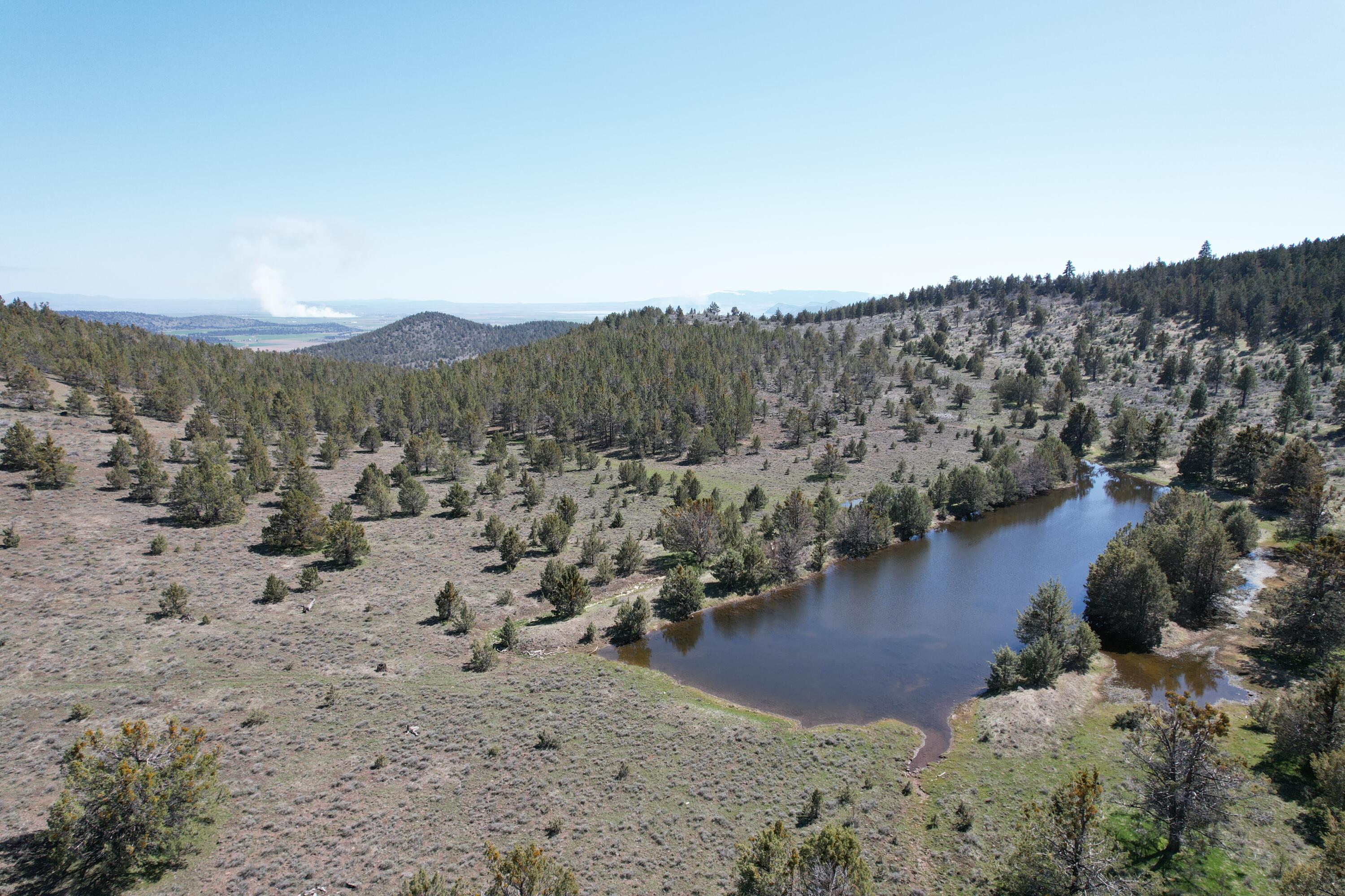 Discover the exceptional 1,850-acre ranch located in Klamath County, Oregon, where privacy and natural beauty unite. This incredible property features 80 acres of fertile dry land meadow ground, perfect for grazing or farming, alongside miles of well-maintained roads and trails ideal for hiking, horseback riding, and off-road adventures. A true wildlife haven, the ranch is teeming with diverse animals, offering excellent opportunities for hunting and birdwatching. Enjoy the tranquil scenery with two picturesque ponds and several springs that enrich the landscape and support vibrant ecosystems. With stunning views of Mount Shasta as your backdrop, this expansive property provides complete seclusion, making it an ideal retreat from the hustle and bustle of everyday life. Embrace the chance to own this extraordinary ranch where nature and opportunity converge. Schedule your private tour today to explore all that this remarkable property has to offer!