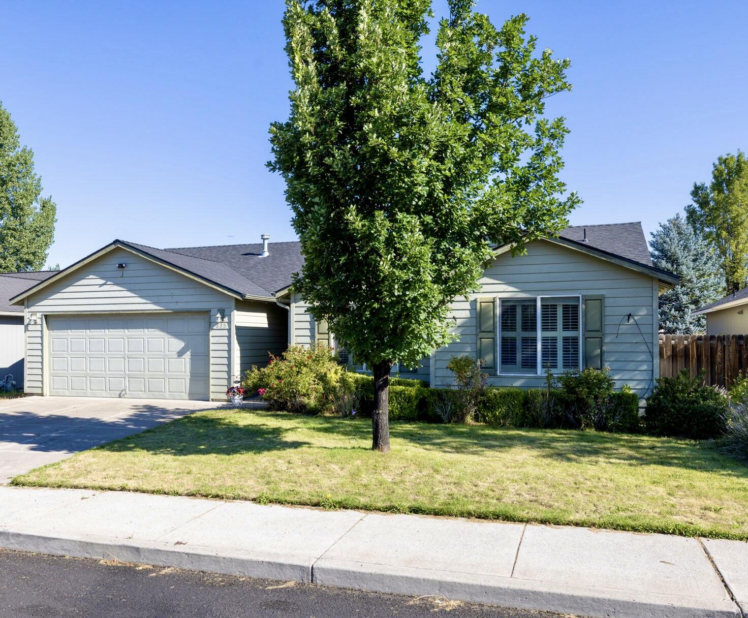 Welcome to 835 NE Nickernut Ave! This 3 bed, 2 bath home offers 1,502 sq ft of single-level living in a quiet NE Redmond neighborhood. Built in 2000, it features natural gas heat, a cozy gas fireplace, and an open, functional layout. The kitchen includes ample cabinet space, pantry, desk, and opens to a dining area with backyard access-perfect for entertaining or relaxing. The primary suite offers a private bath and walk-in closet. The fully fenced backyard is ready for your personal touch-ideal for pets, play, gardening, or creating your outdoor oasis. Additional features include a 2-car garage, laundry area, and front landscaping w/sprinkler system. Conveniently located near parks, schools, and shopping. A great opportunity to make it your own!  New roof in 2022.