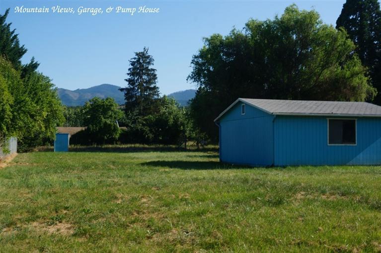 Amazing .61 acre lot on desirable Shafer Lane in SW Medford, with detached 2 car garage. This property has gorgeous views of surrounding mountains. The property is completely fenced and has a gated driveway. Value is in the land and the outbuilding. Build your dream home or install a new manufactured home. Residential building subject to City of Medfords assessment of habitability. Only garage can be shown, for safety reasons. Buyer to do own due diligence on removal of damaged residential dwelling. Property is an estate. Please allow 3-4 business days to respond to offers. Not a short sale or REO.
