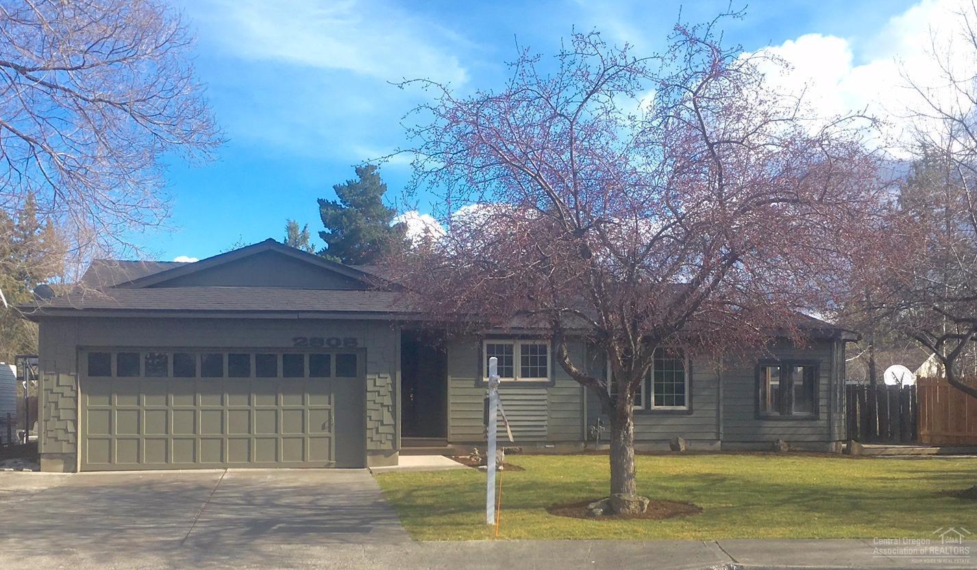 Squeaky clean 3 bedroom, 2 bath home with 1354 sq. ft. of living area. New paint, carpet, appliances including stainless refrigerator, dishwasher, range/oven, microwave. Large living area with gas stove for extra warmth. Nice sized bedrooms with large master bedroom and bath. Kitchen with dining area and a extra large sun room. Double car attached garage. Plus a huge .20 acre lot with new underground sprinklers and landscaping.This home is ready to go.