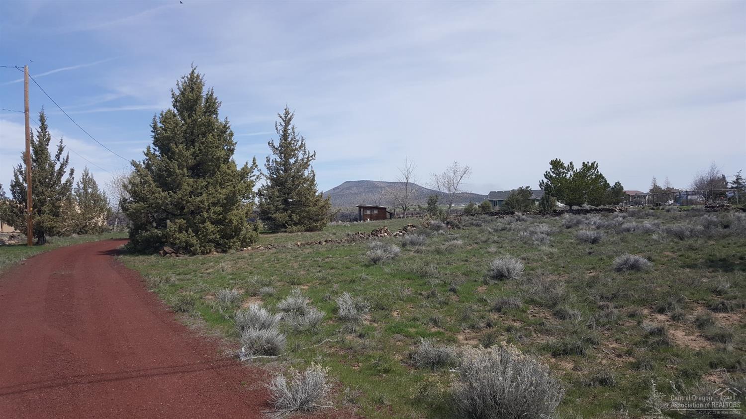 Amazing Rimrock and Cascade Mountain views from this lot in beautiful Crooked River Ranch. Lot is located on the edge of the rim so the views are protected. Flat building site with electricity, water, and septic already installed. Small storage building on site, was previously used as RV site. Golfing, community swimming pool, tennis and pickleball courts, hiking and fishing. A welcoming community waiting for you!