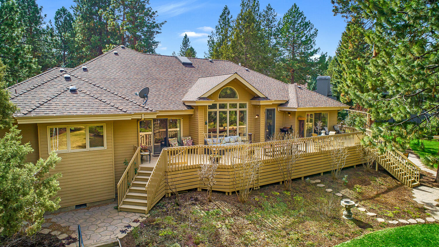 Experience luxury living in the prestigious Mountain High community of Bend! Lavish, meticulously maintained interior boasts a breathtaking vaulted great room, gourmet kitchen for the most dedicated of home chefs, and an opulent primary suite. Elegant, tasteful finishes throughout, including marble flooring, jetted tub, stainless steel appliances, formal and informal entertaining space. With ample natural light and lovely views from every room, the sumptuous interior is equally balanced with an exquisite outdoor living experience. An expansive deck overlooks beautifully landscaped grounds while paver patios and walkways surround stunning seasonal blooms and charming water features. Community amenities include pool, pickle ball and tennis court access. Please call today to schedule a showing!